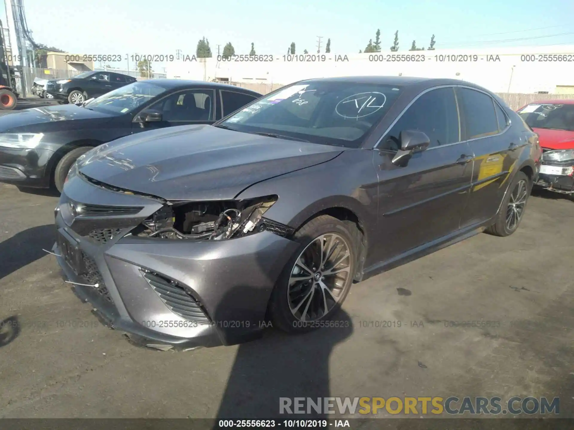 2 Photograph of a damaged car 4T1B11HK2KU195477 TOYOTA CAMRY 2019