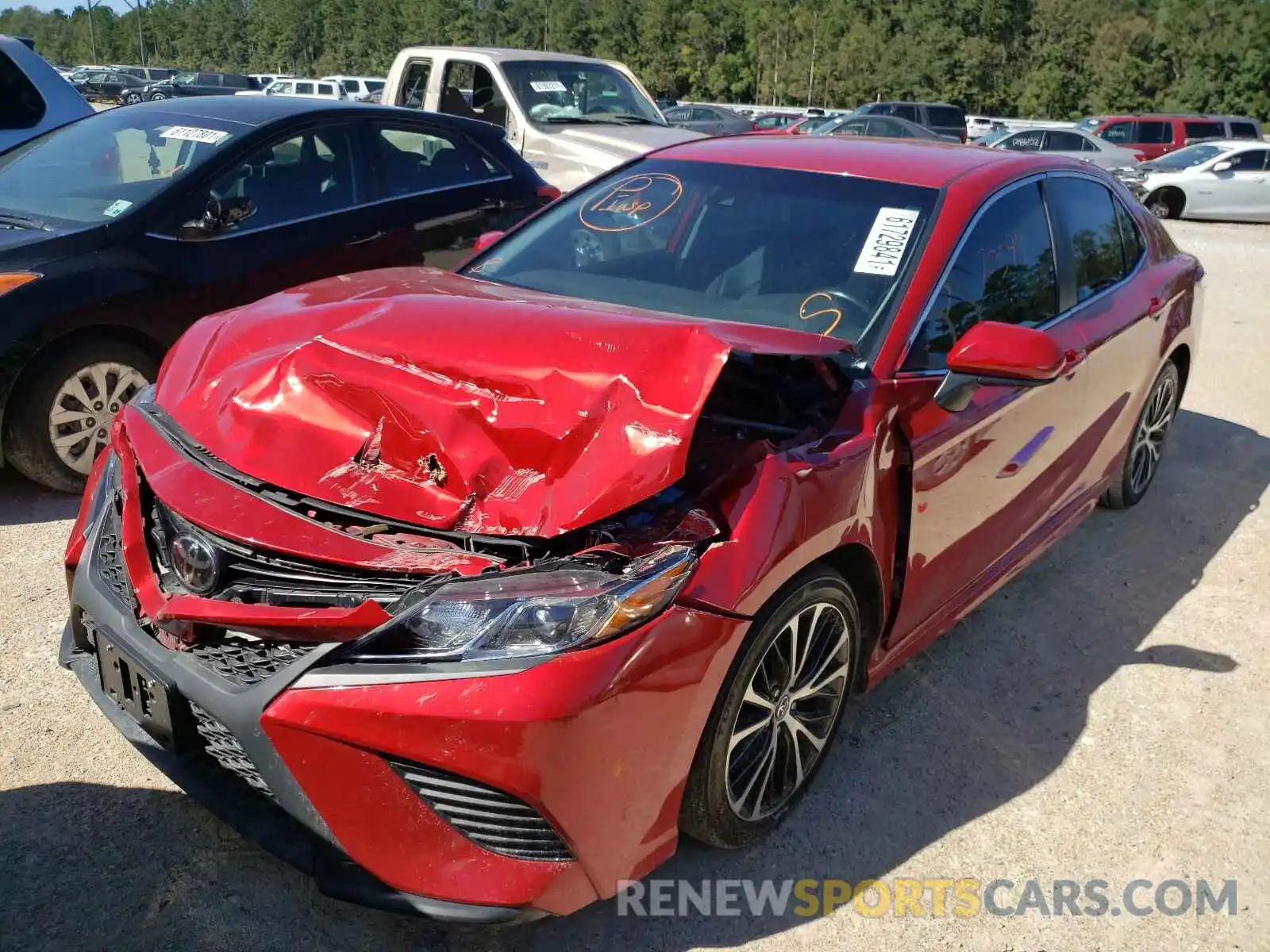 2 Photograph of a damaged car 4T1B11HK2KU198993 TOYOTA CAMRY 2019