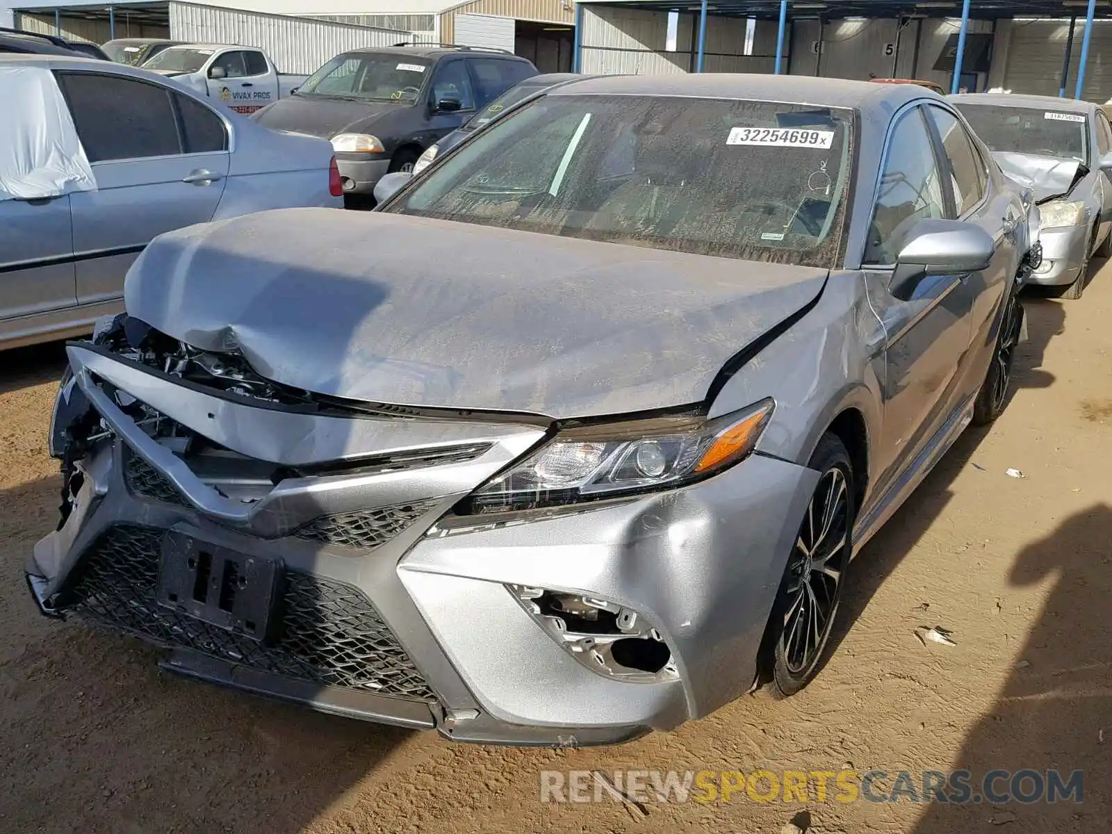 2 Photograph of a damaged car 4T1B11HK2KU204338 TOYOTA CAMRY 2019