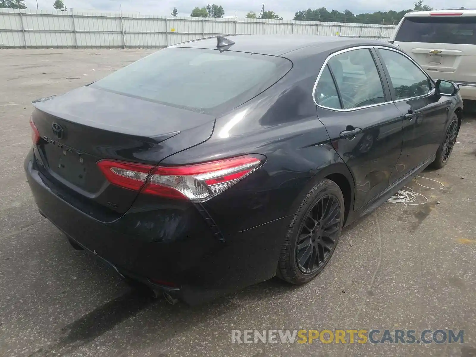 4 Photograph of a damaged car 4T1B11HK2KU206977 TOYOTA CAMRY 2019