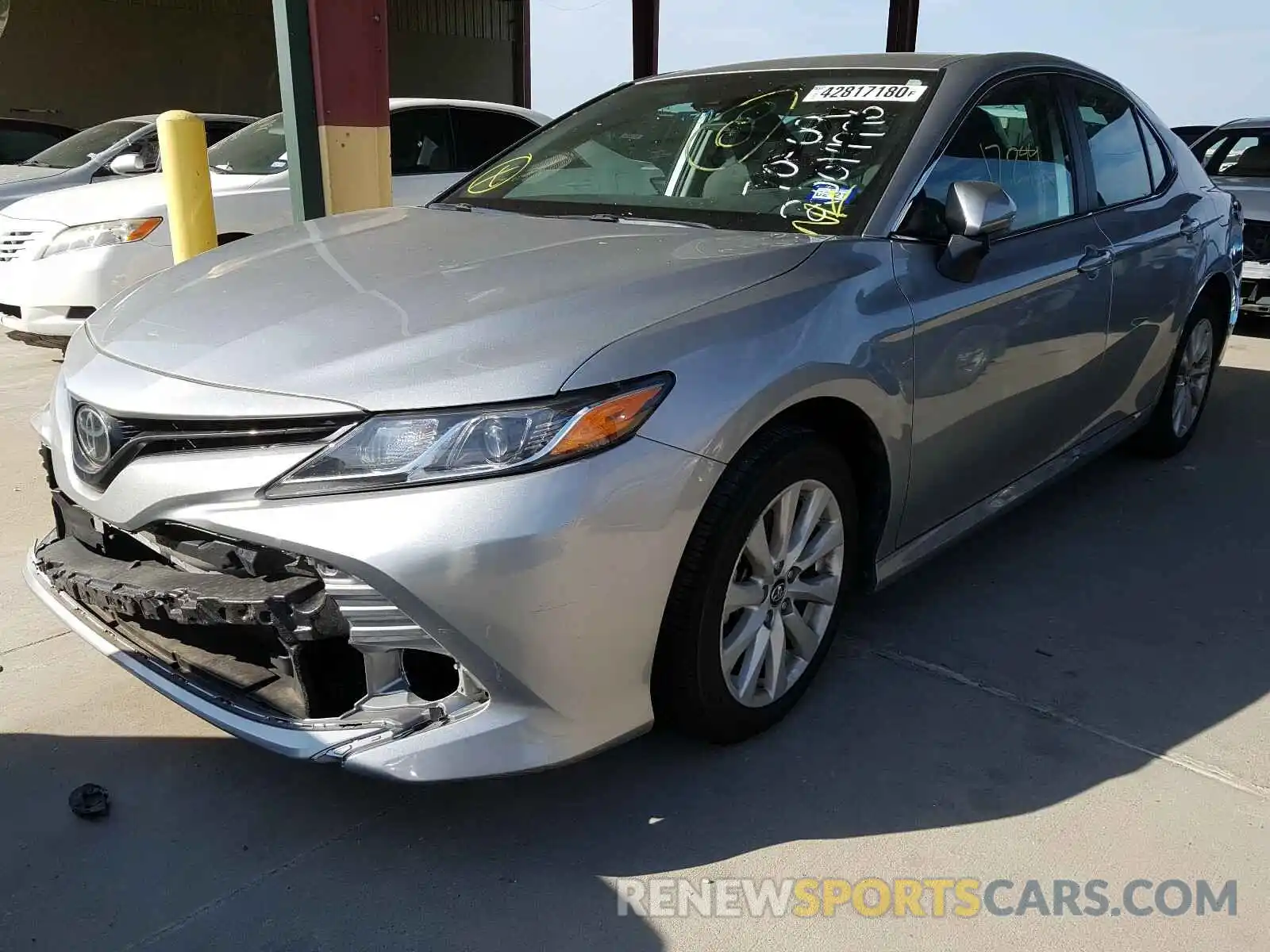 2 Photograph of a damaged car 4T1B11HK2KU209314 TOYOTA CAMRY 2019