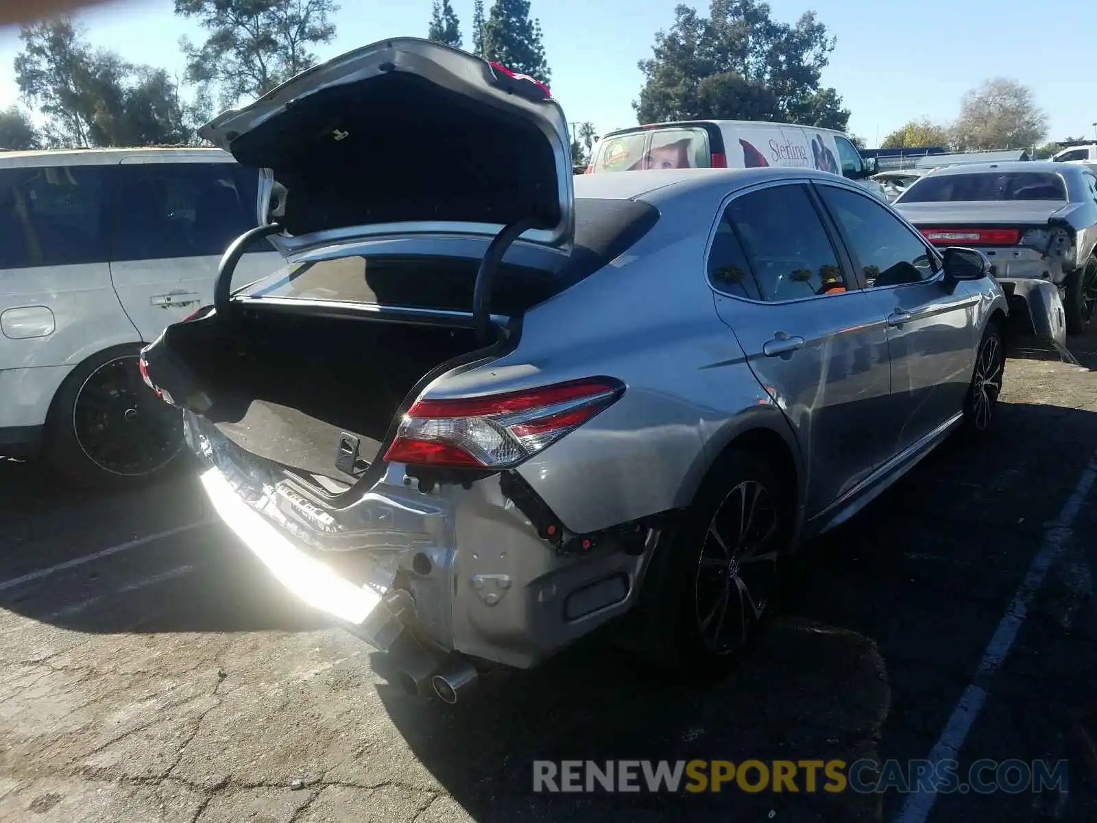 4 Photograph of a damaged car 4T1B11HK2KU210396 TOYOTA CAMRY 2019