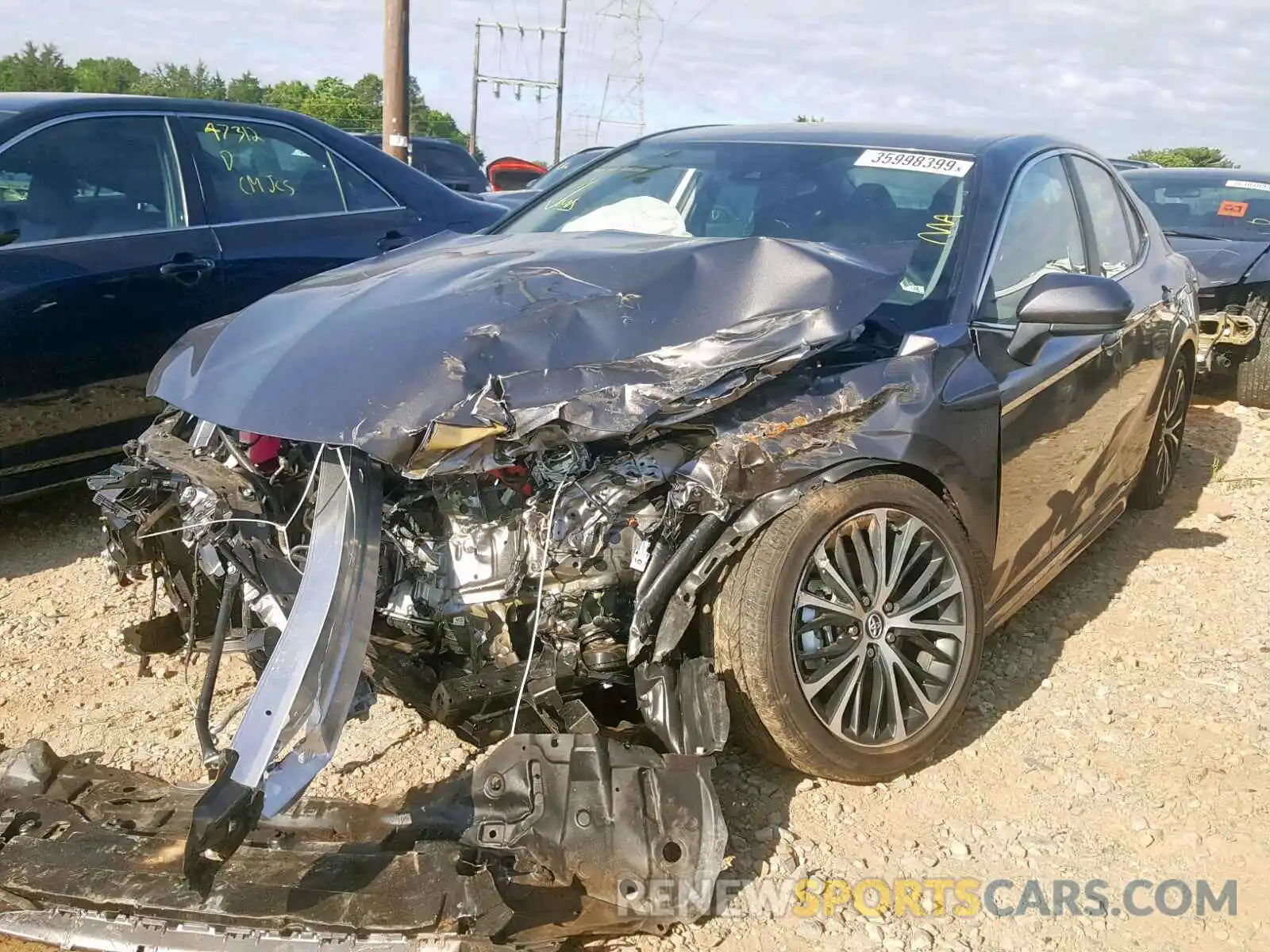 2 Photograph of a damaged car 4T1B11HK2KU212424 TOYOTA CAMRY 2019