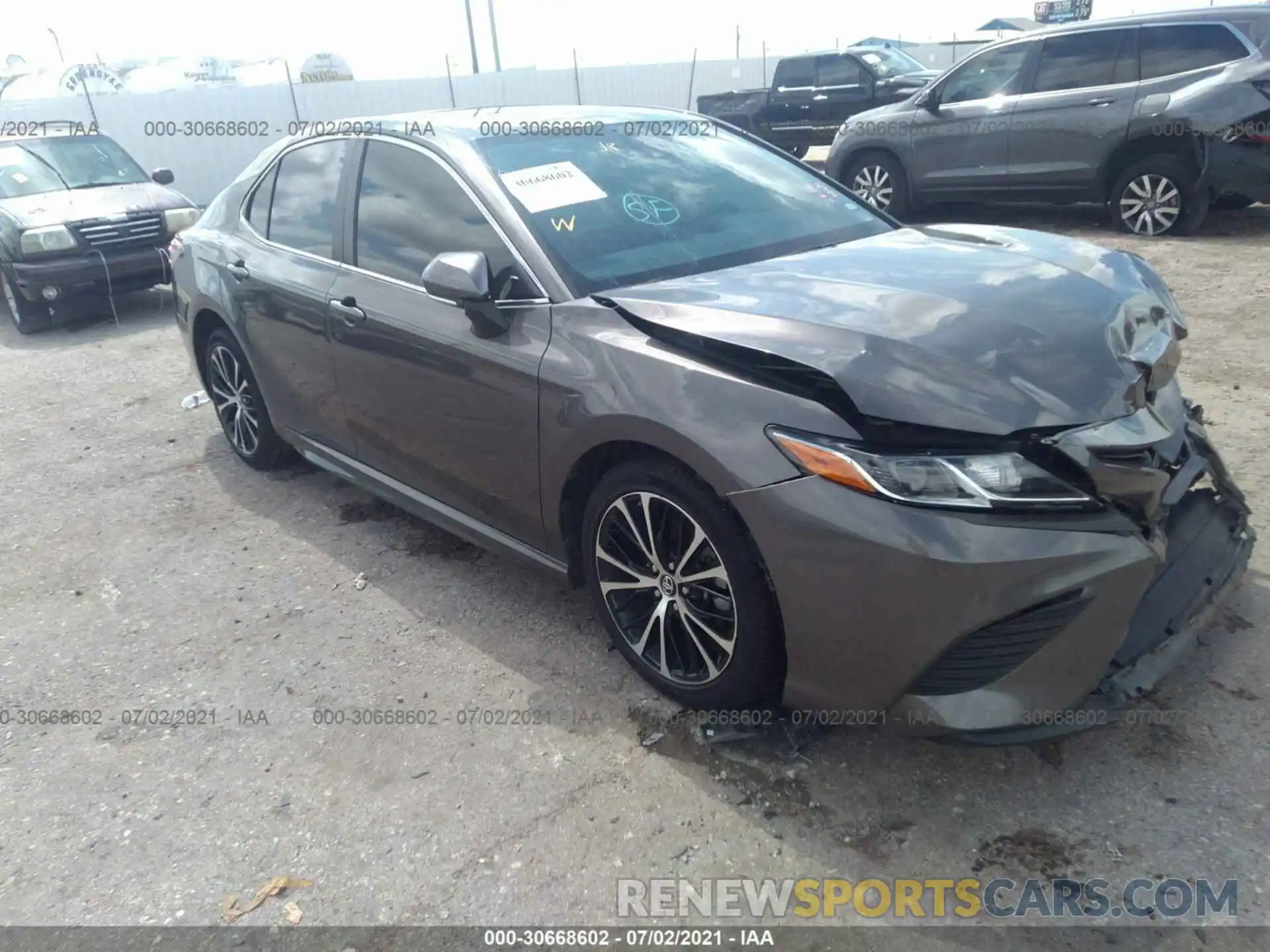 1 Photograph of a damaged car 4T1B11HK2KU213427 TOYOTA CAMRY 2019