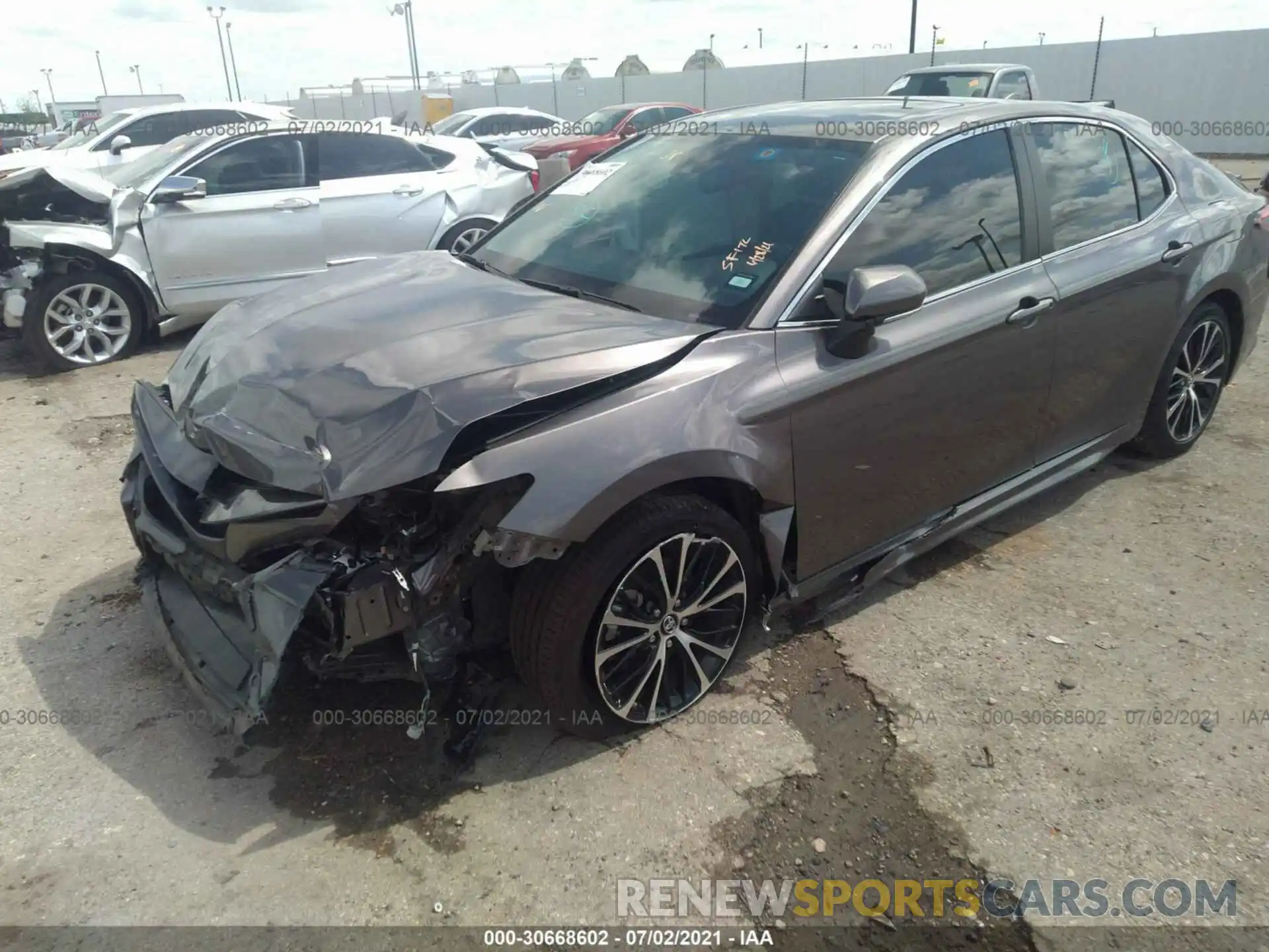 2 Photograph of a damaged car 4T1B11HK2KU213427 TOYOTA CAMRY 2019