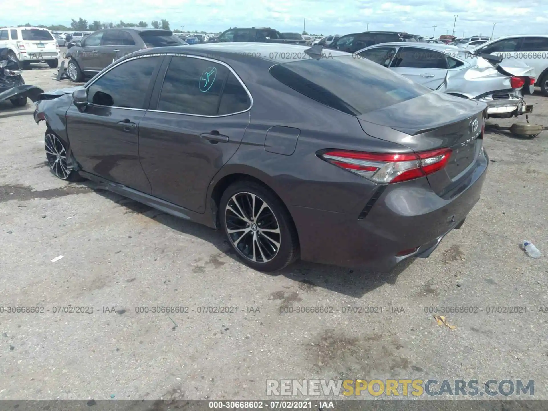 3 Photograph of a damaged car 4T1B11HK2KU213427 TOYOTA CAMRY 2019