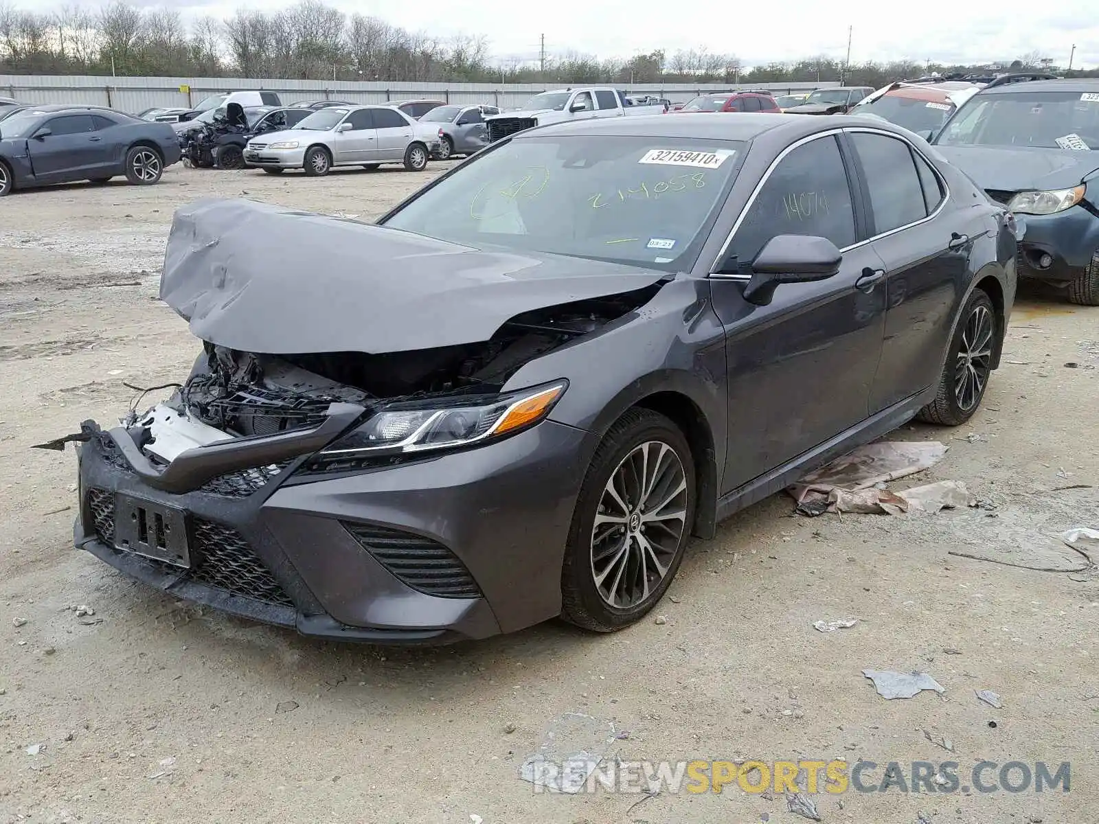 2 Photograph of a damaged car 4T1B11HK2KU214058 TOYOTA CAMRY 2019