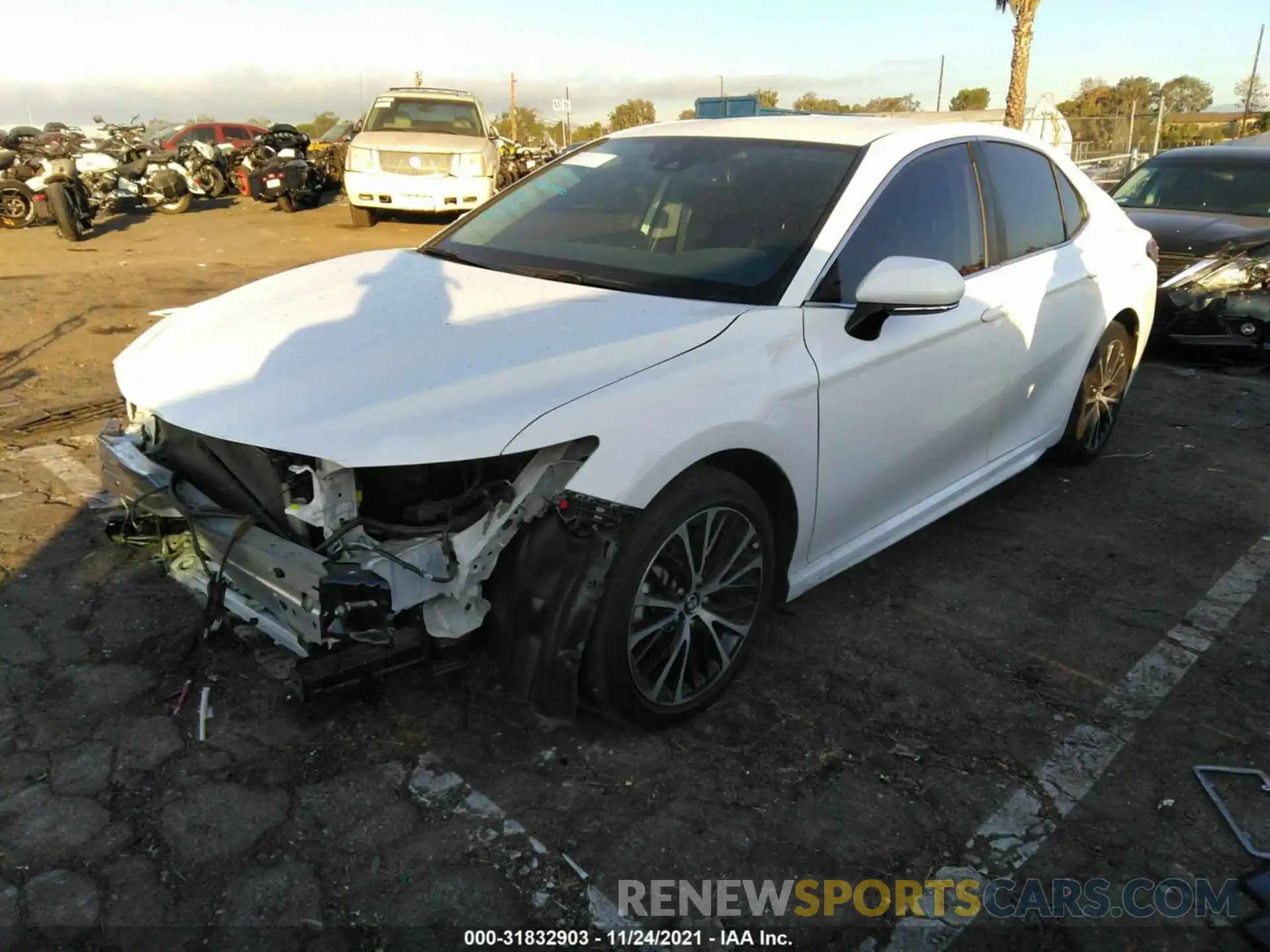 2 Photograph of a damaged car 4T1B11HK2KU214593 TOYOTA CAMRY 2019