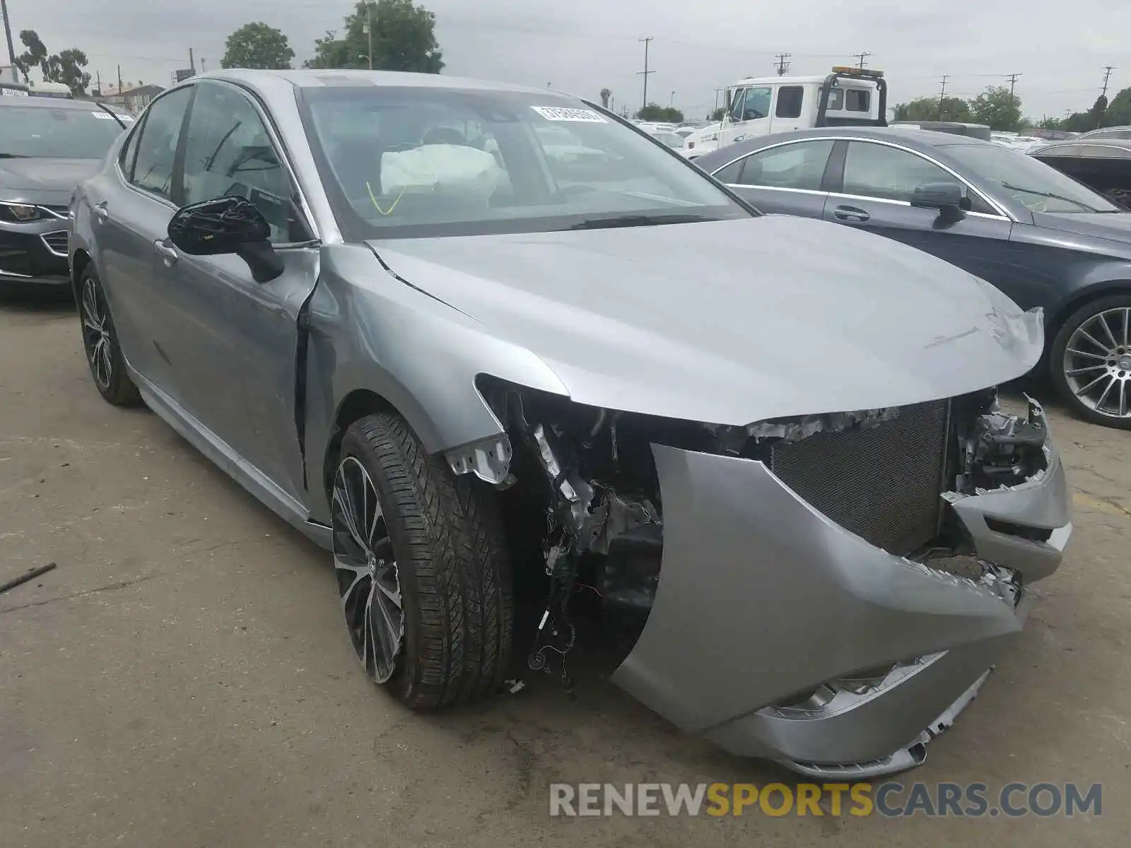 1 Photograph of a damaged car 4T1B11HK2KU214965 TOYOTA CAMRY 2019