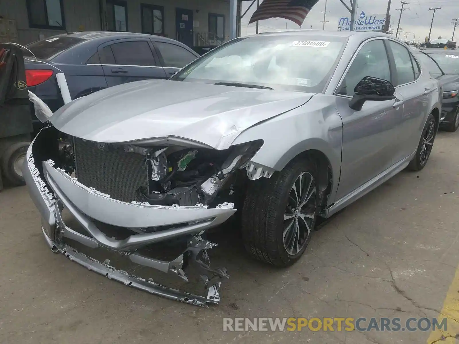 2 Photograph of a damaged car 4T1B11HK2KU214965 TOYOTA CAMRY 2019