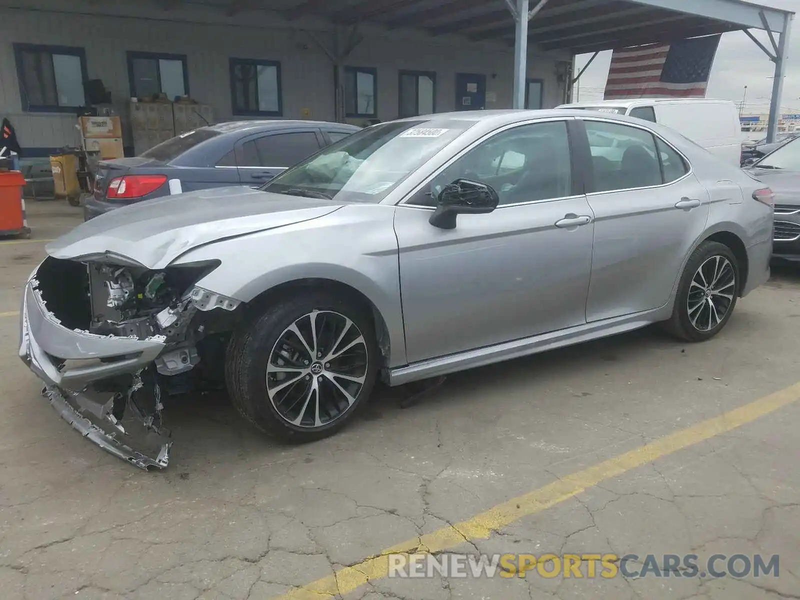 9 Photograph of a damaged car 4T1B11HK2KU214965 TOYOTA CAMRY 2019