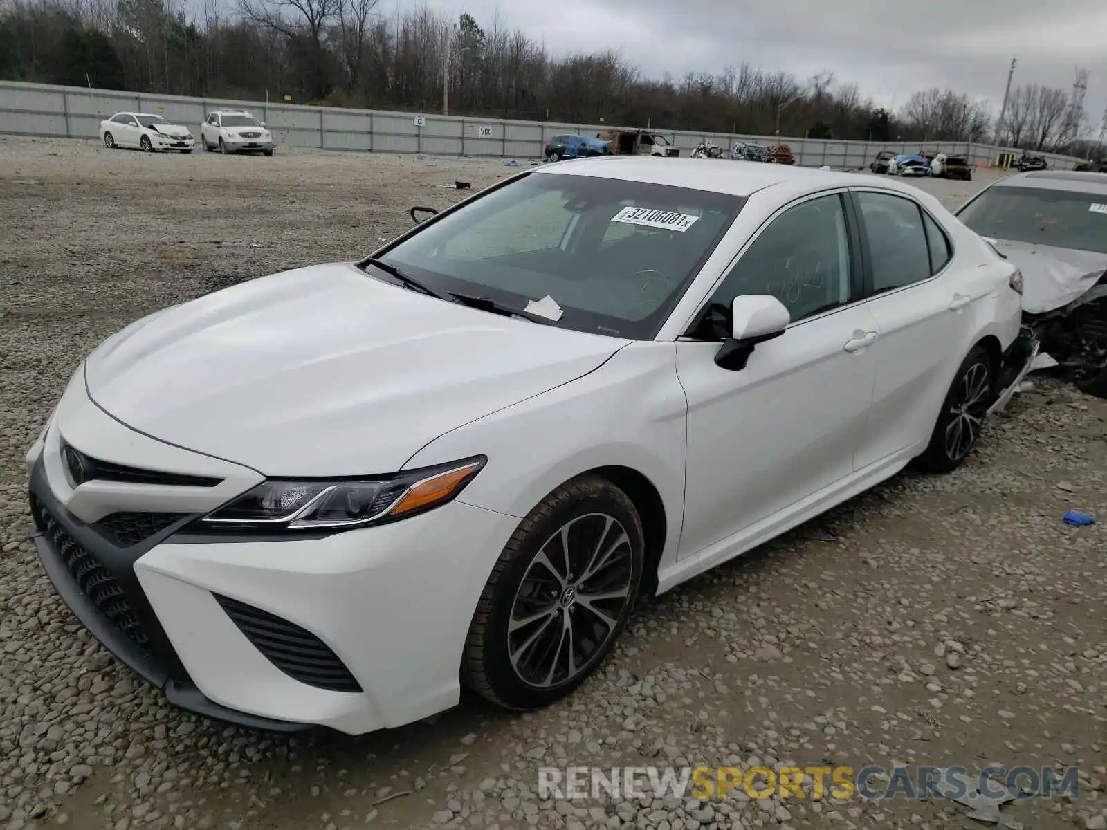 2 Photograph of a damaged car 4T1B11HK2KU215601 TOYOTA CAMRY 2019