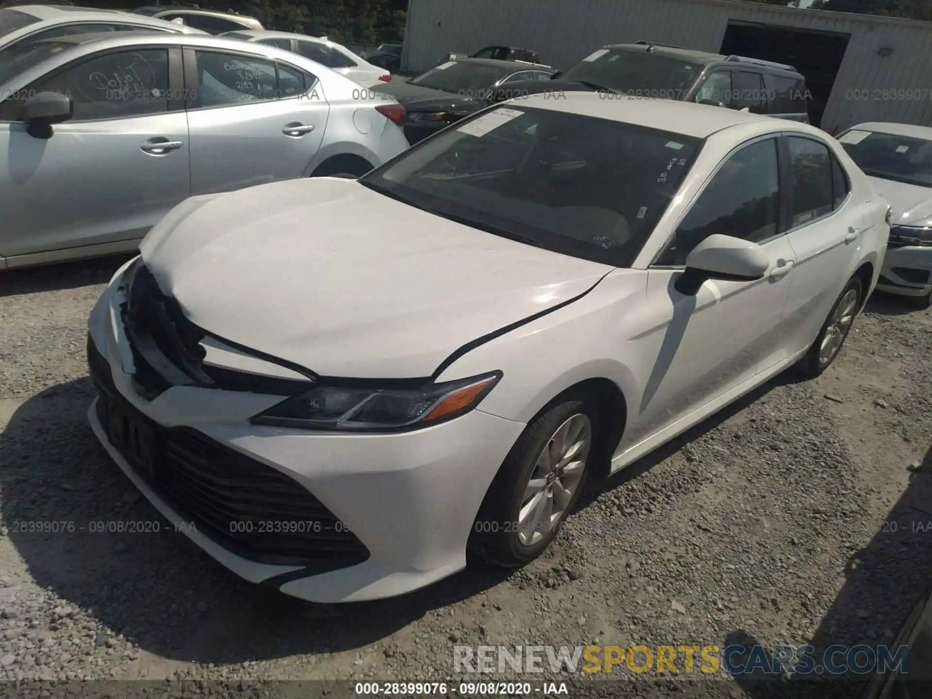 2 Photograph of a damaged car 4T1B11HK2KU216179 TOYOTA CAMRY 2019