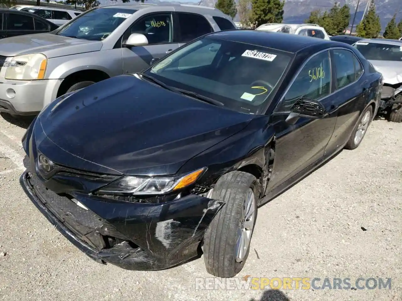 2 Photograph of a damaged car 4T1B11HK2KU216215 TOYOTA CAMRY 2019