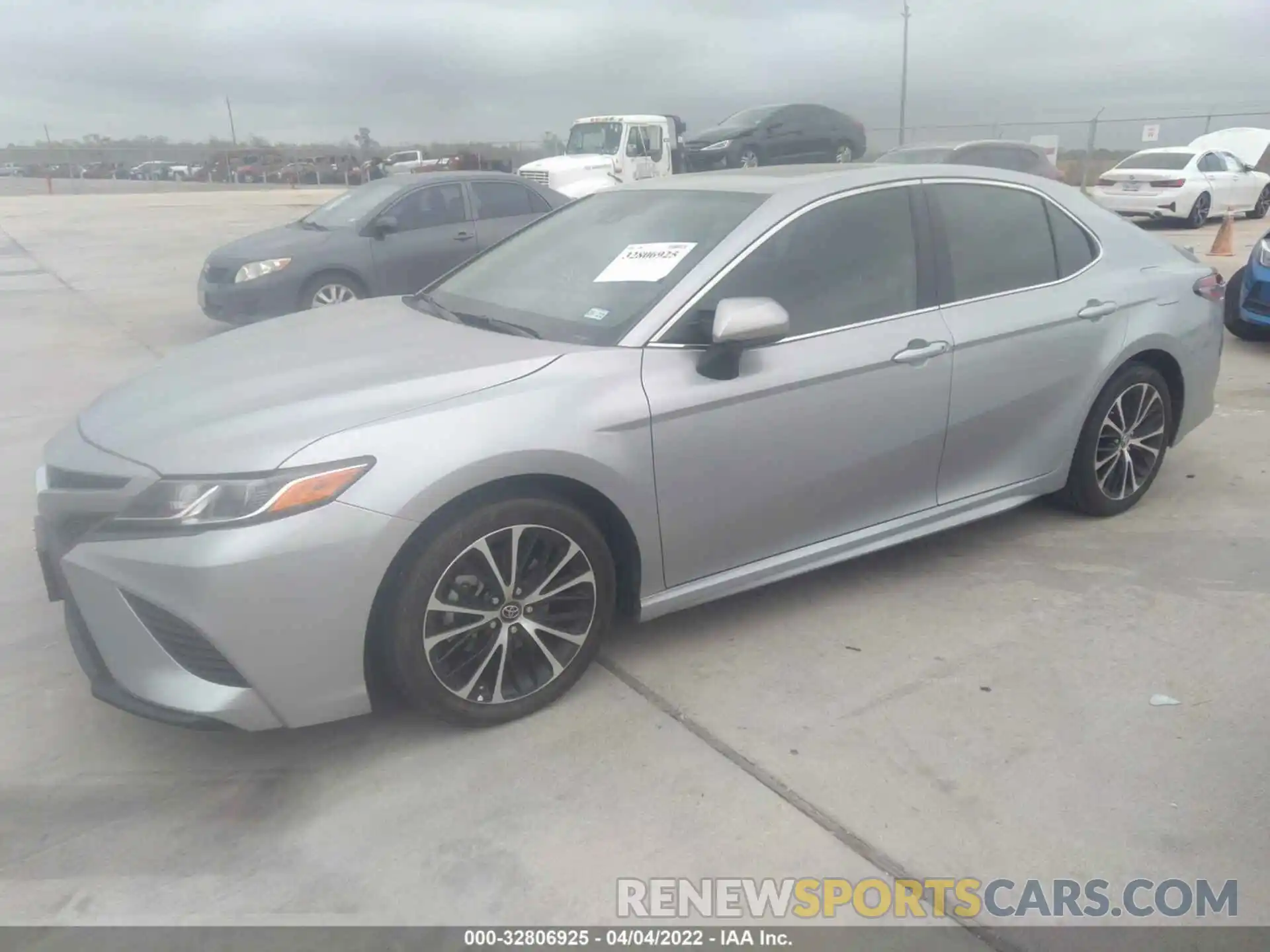 2 Photograph of a damaged car 4T1B11HK2KU222063 TOYOTA CAMRY 2019