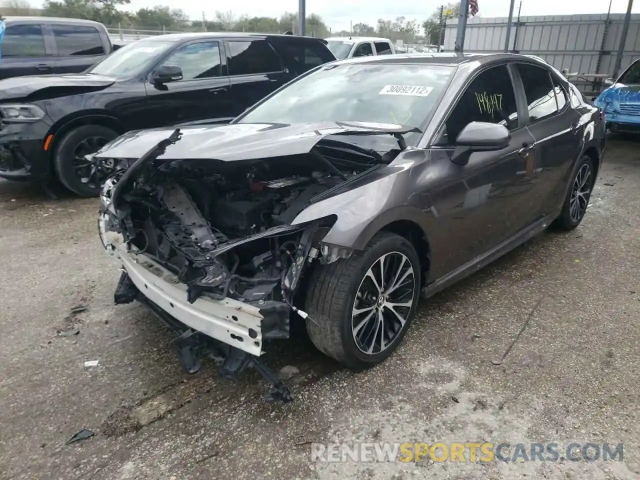 2 Photograph of a damaged car 4T1B11HK2KU227103 TOYOTA CAMRY 2019