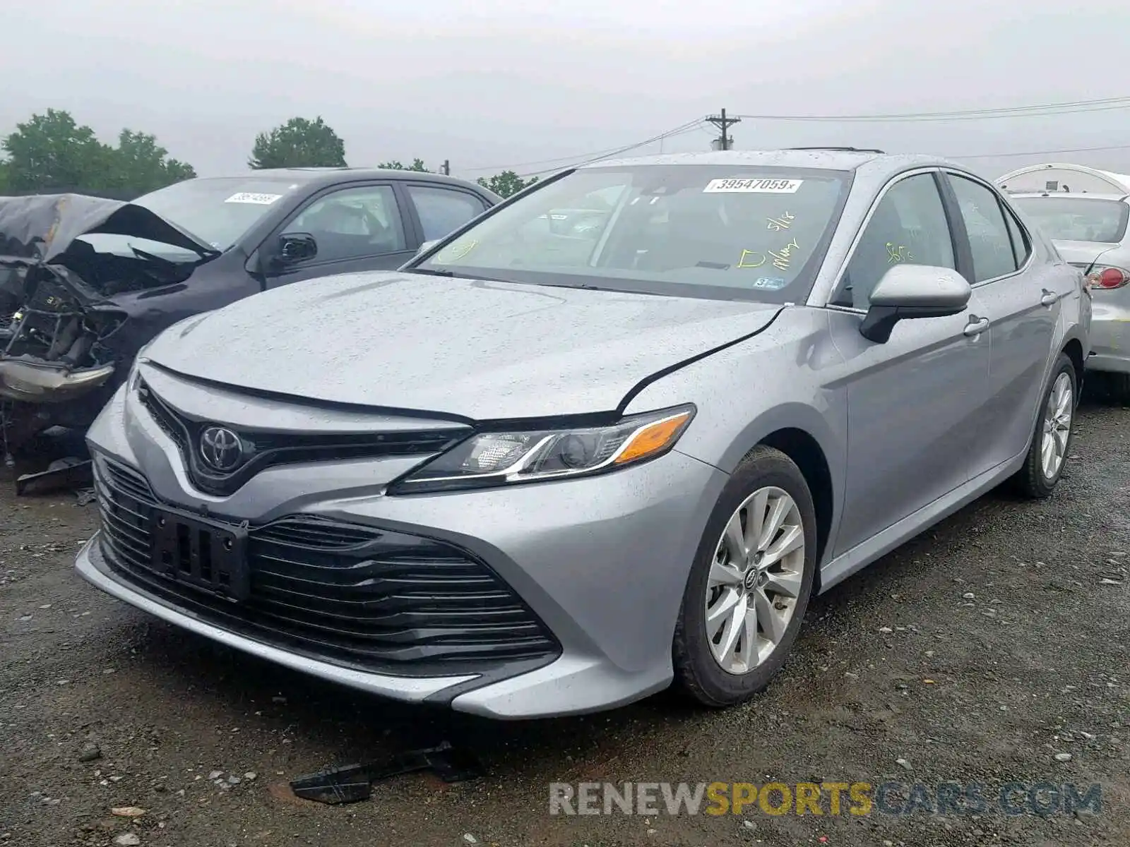 2 Photograph of a damaged car 4T1B11HK2KU229806 TOYOTA CAMRY 2019