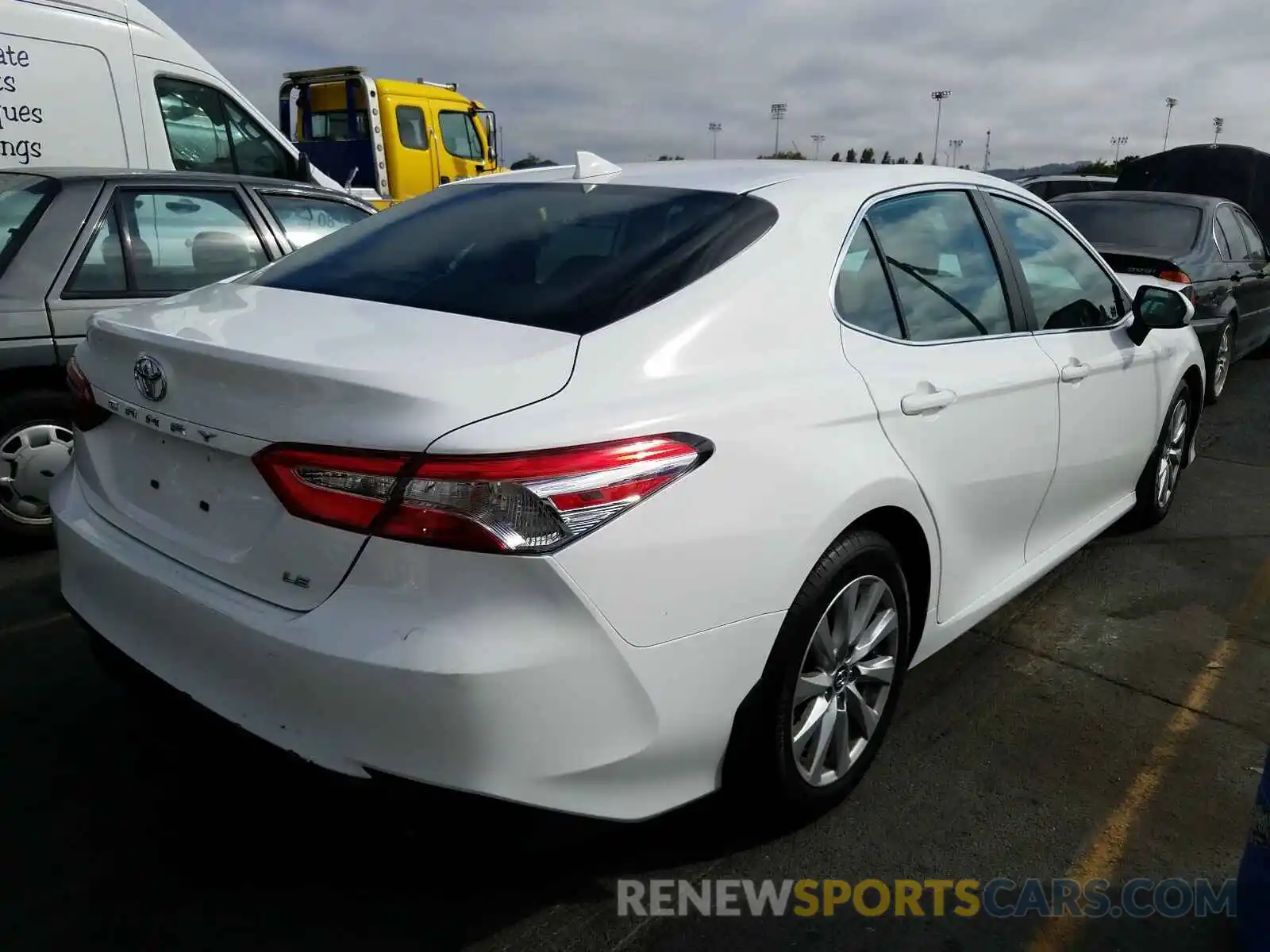 4 Photograph of a damaged car 4T1B11HK2KU230616 TOYOTA CAMRY 2019