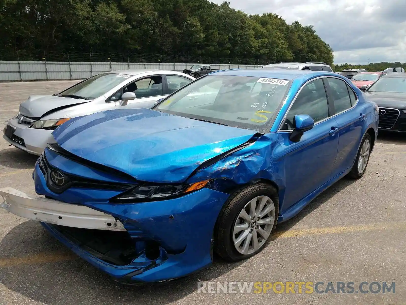 2 Photograph of a damaged car 4T1B11HK2KU235704 TOYOTA CAMRY 2019