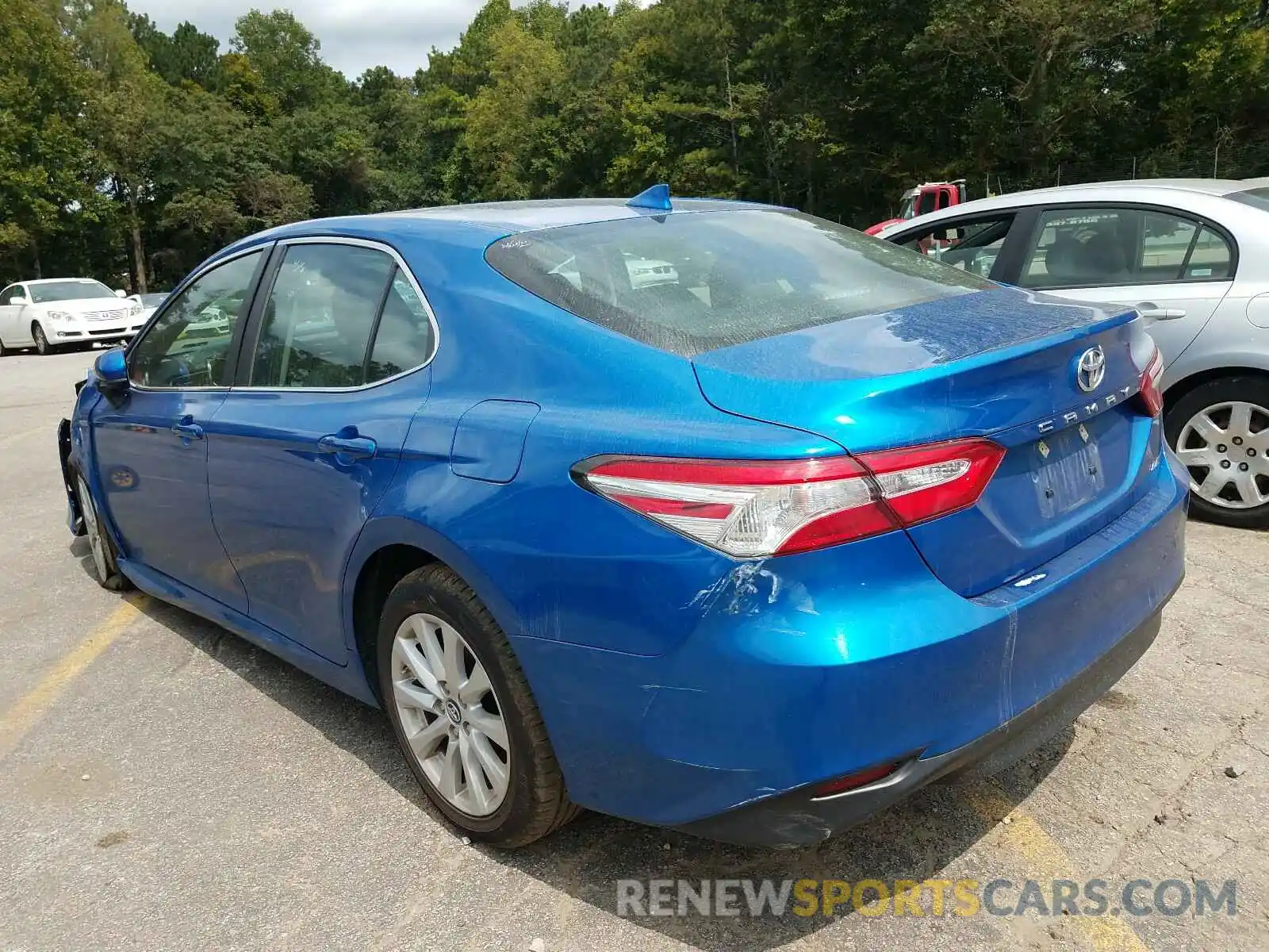 3 Photograph of a damaged car 4T1B11HK2KU235704 TOYOTA CAMRY 2019