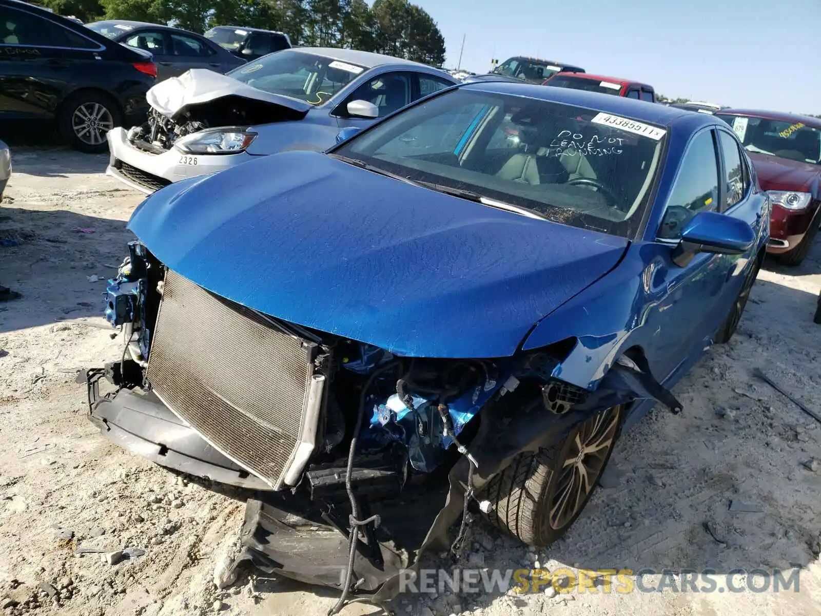 2 Photograph of a damaged car 4T1B11HK2KU238991 TOYOTA CAMRY 2019