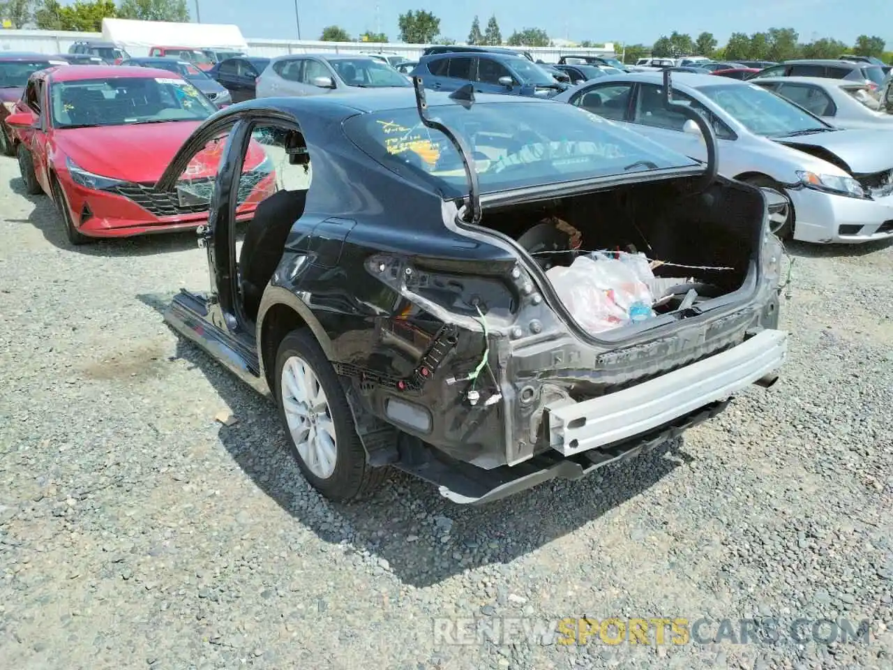 3 Photograph of a damaged car 4T1B11HK2KU240501 TOYOTA CAMRY 2019