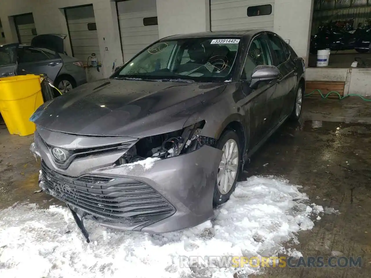 2 Photograph of a damaged car 4T1B11HK2KU241129 TOYOTA CAMRY 2019