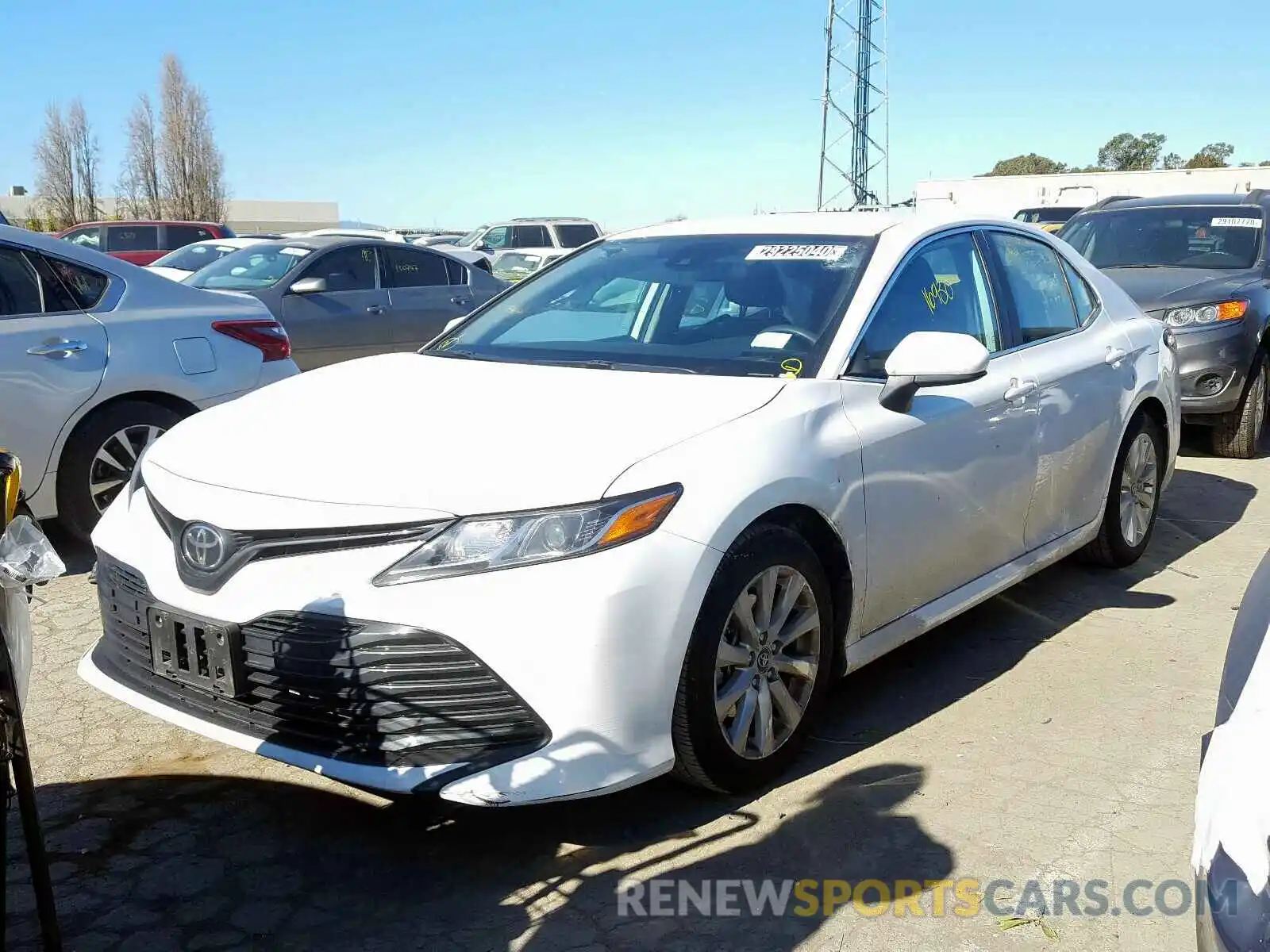 2 Photograph of a damaged car 4T1B11HK2KU241311 TOYOTA CAMRY 2019