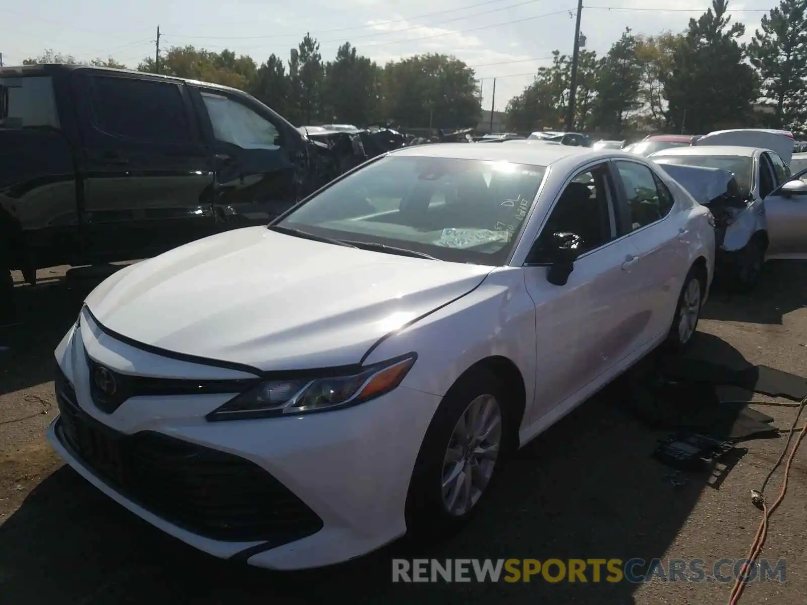 2 Photograph of a damaged car 4T1B11HK2KU242779 TOYOTA CAMRY 2019