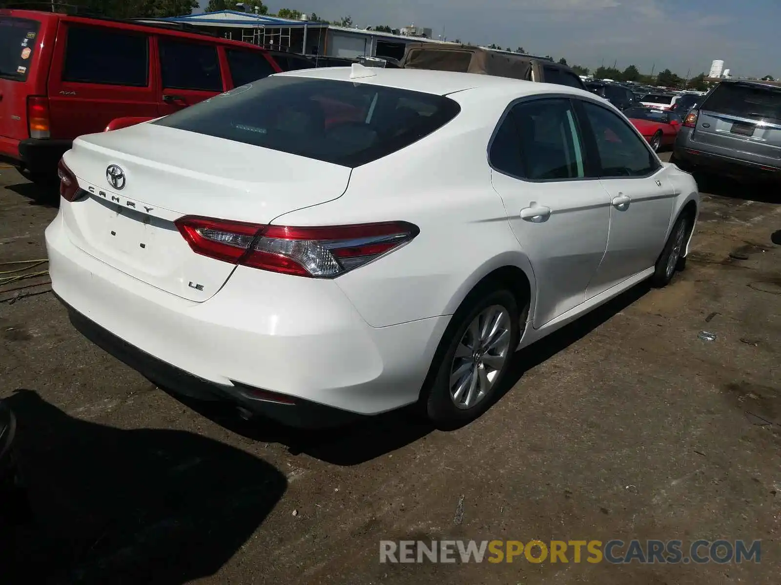 4 Photograph of a damaged car 4T1B11HK2KU242779 TOYOTA CAMRY 2019