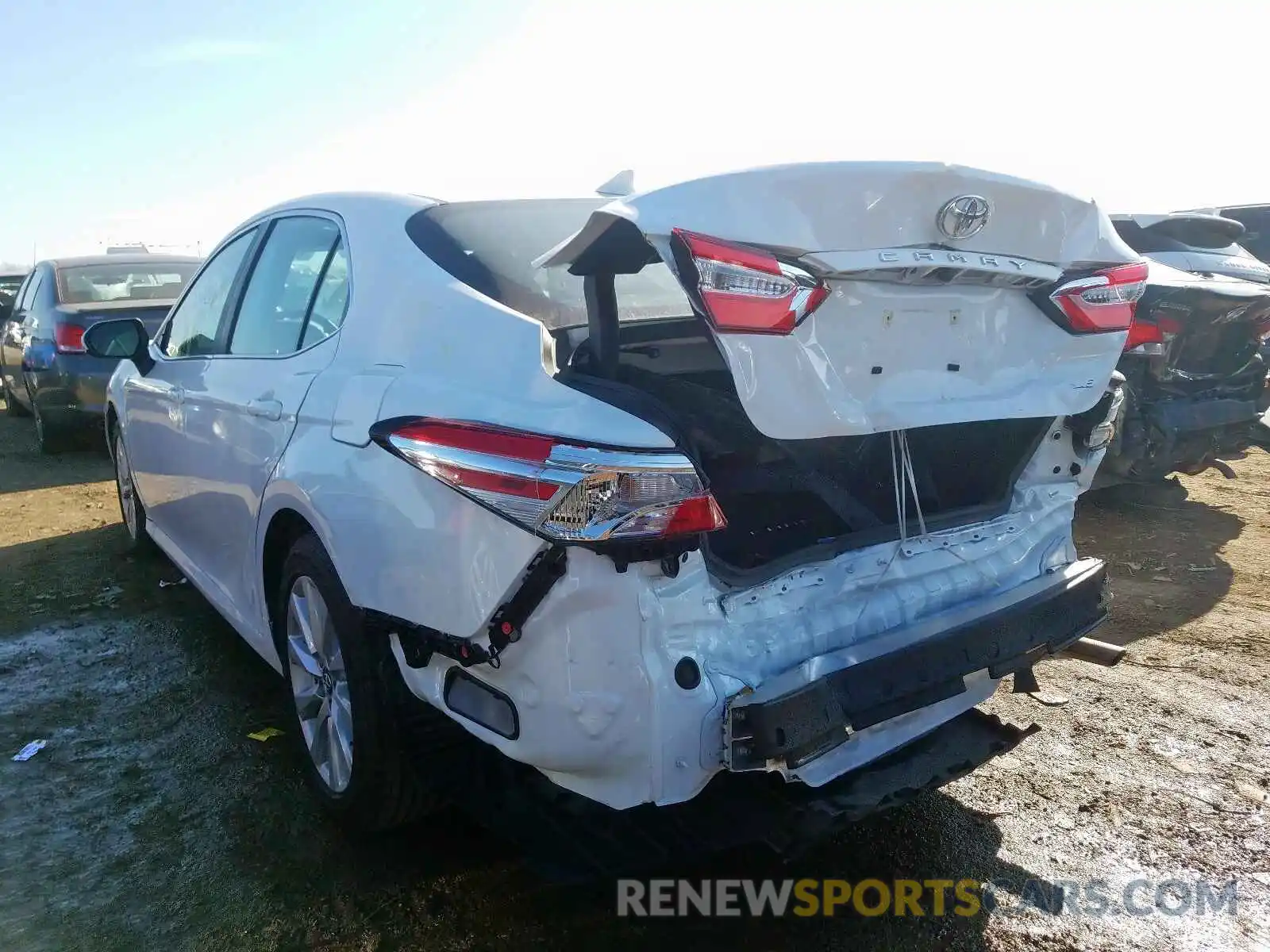 3 Photograph of a damaged car 4T1B11HK2KU242877 TOYOTA CAMRY 2019