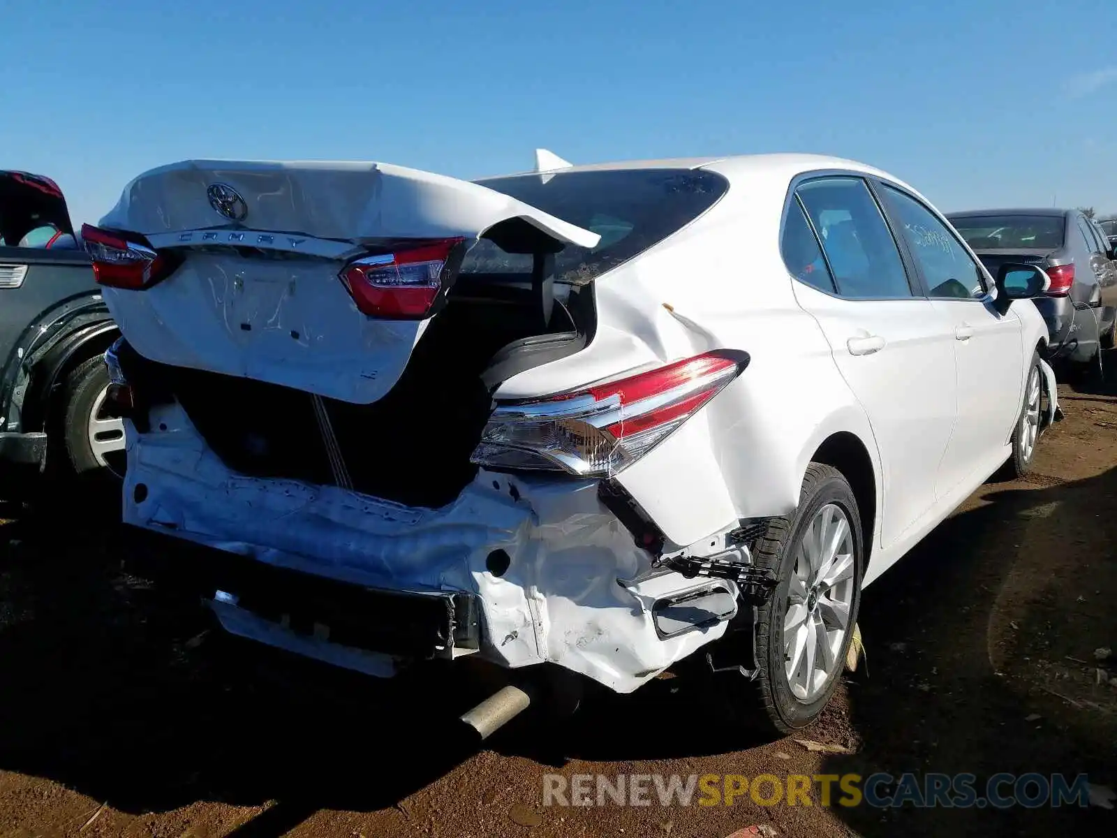 4 Photograph of a damaged car 4T1B11HK2KU242877 TOYOTA CAMRY 2019