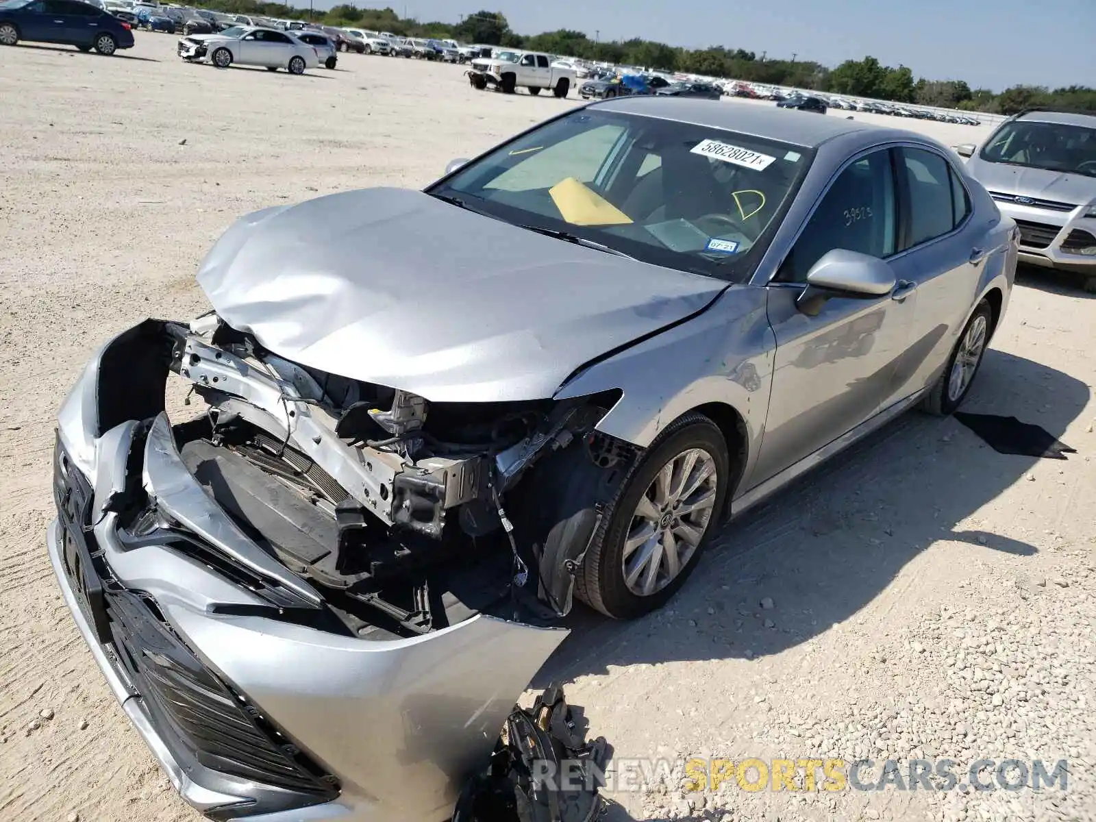 2 Photograph of a damaged car 4T1B11HK2KU249523 TOYOTA CAMRY 2019