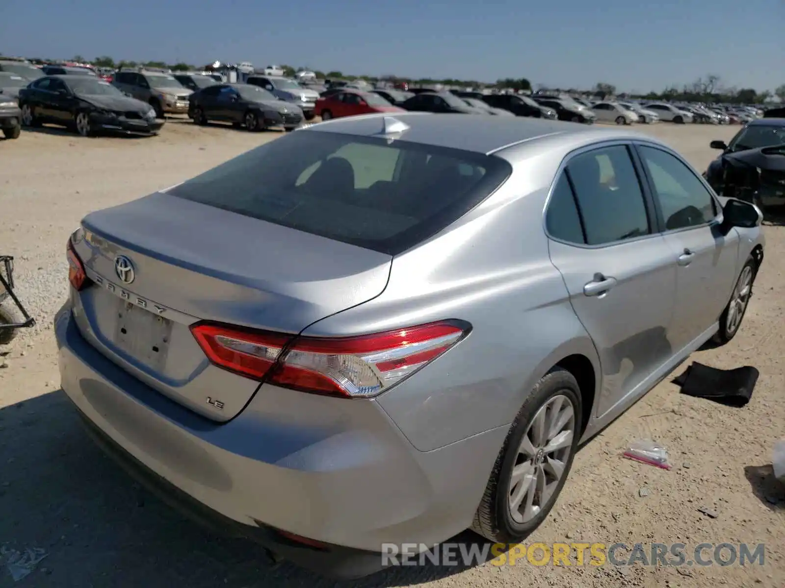 4 Photograph of a damaged car 4T1B11HK2KU249523 TOYOTA CAMRY 2019