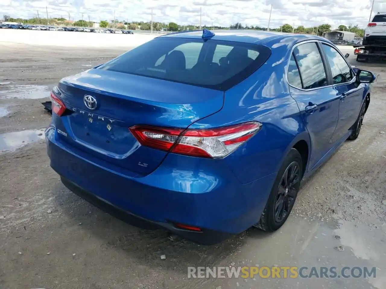 4 Photograph of a damaged car 4T1B11HK2KU249635 TOYOTA CAMRY 2019