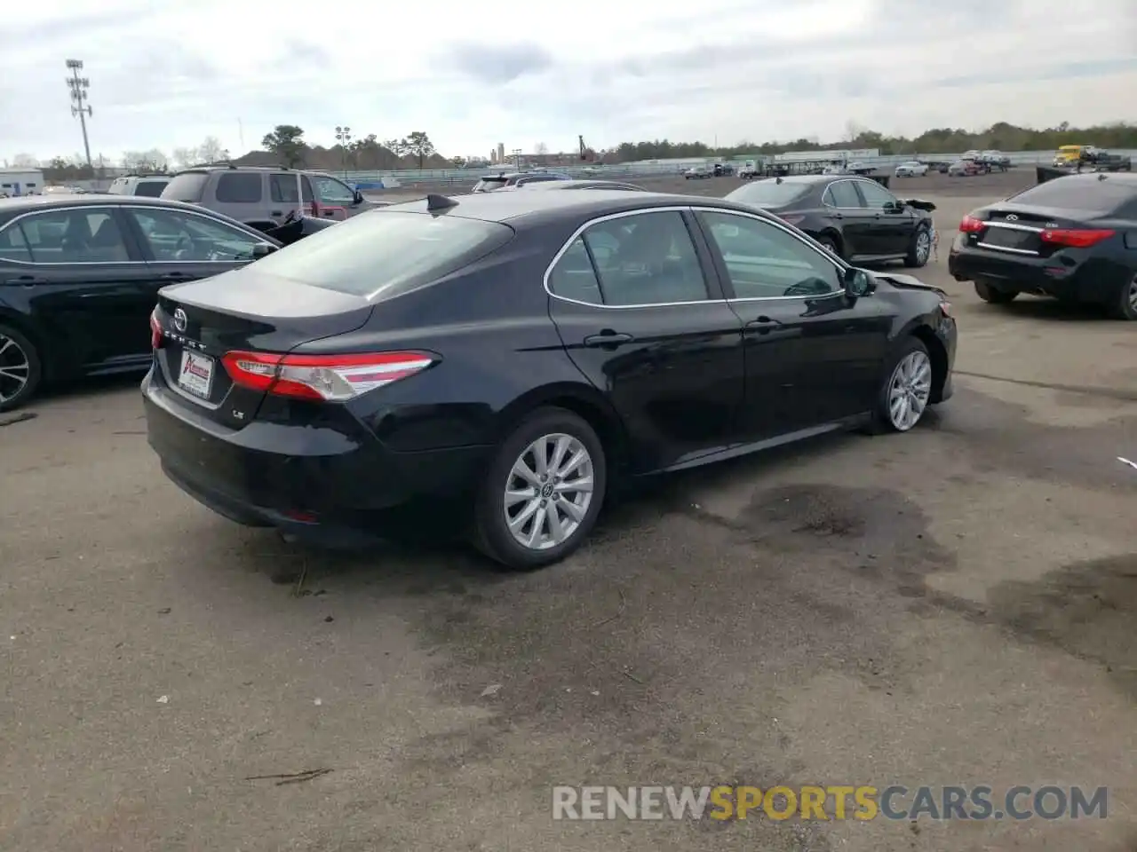 4 Photograph of a damaged car 4T1B11HK2KU249666 TOYOTA CAMRY 2019