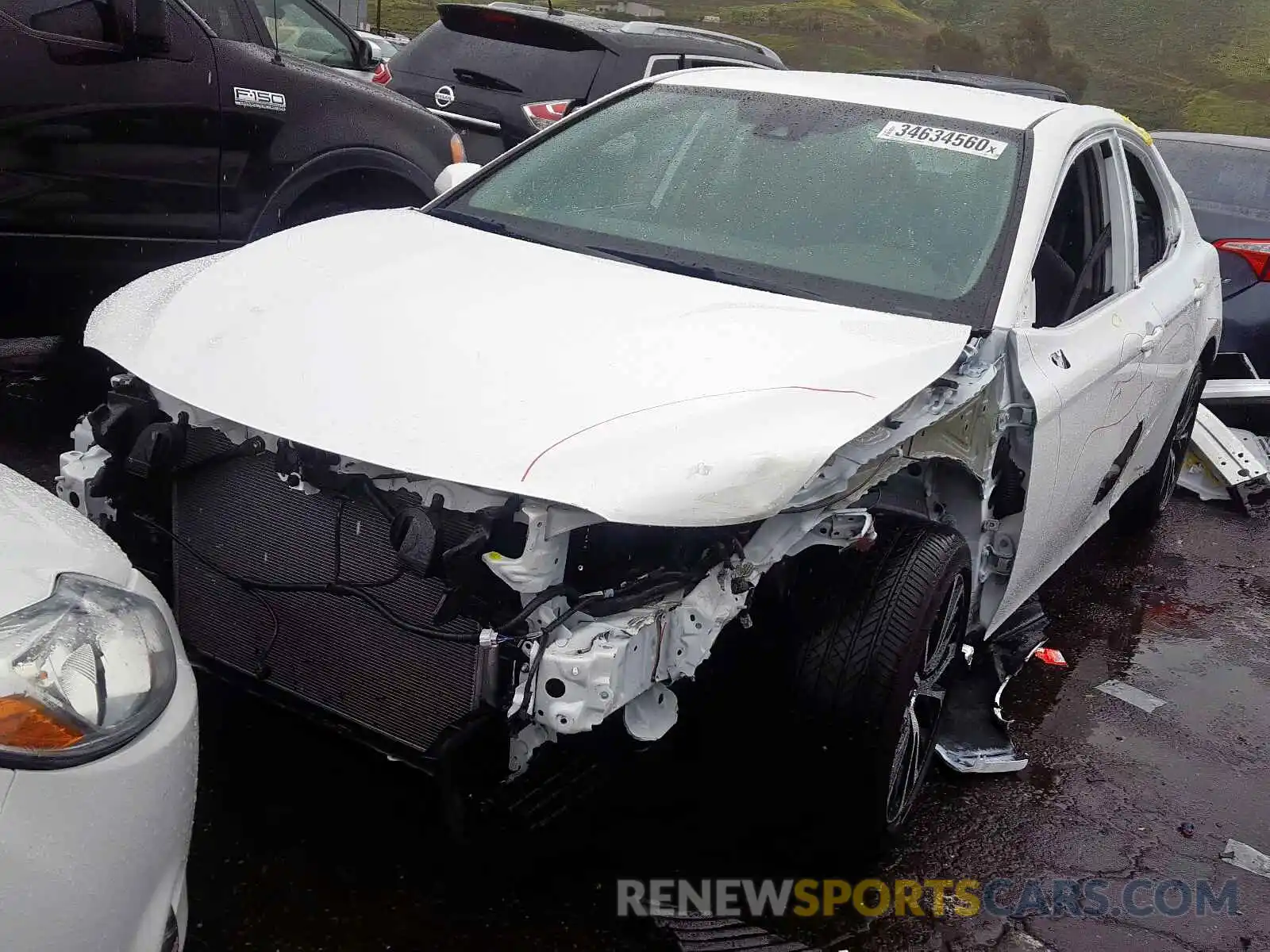 2 Photograph of a damaged car 4T1B11HK2KU250090 TOYOTA CAMRY 2019