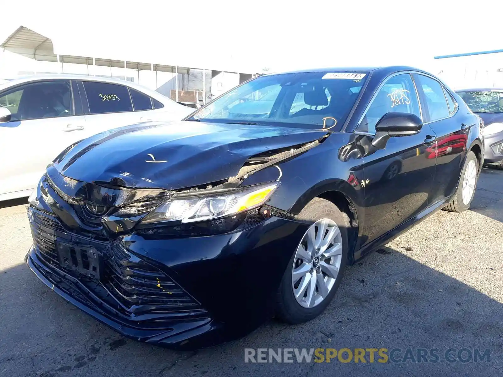 2 Photograph of a damaged car 4T1B11HK2KU250459 TOYOTA CAMRY 2019