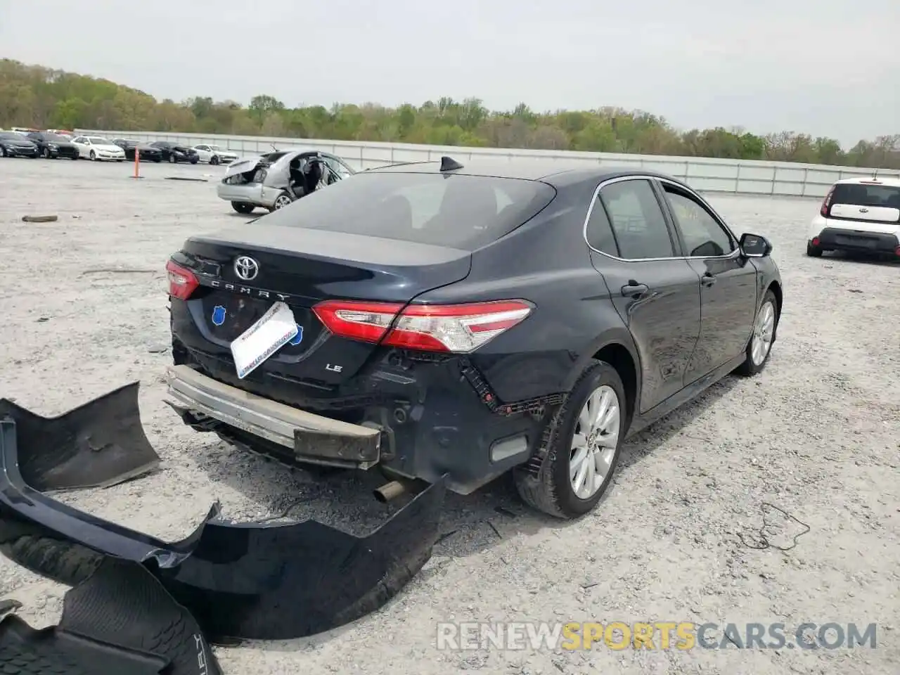 4 Photograph of a damaged car 4T1B11HK2KU250994 TOYOTA CAMRY 2019