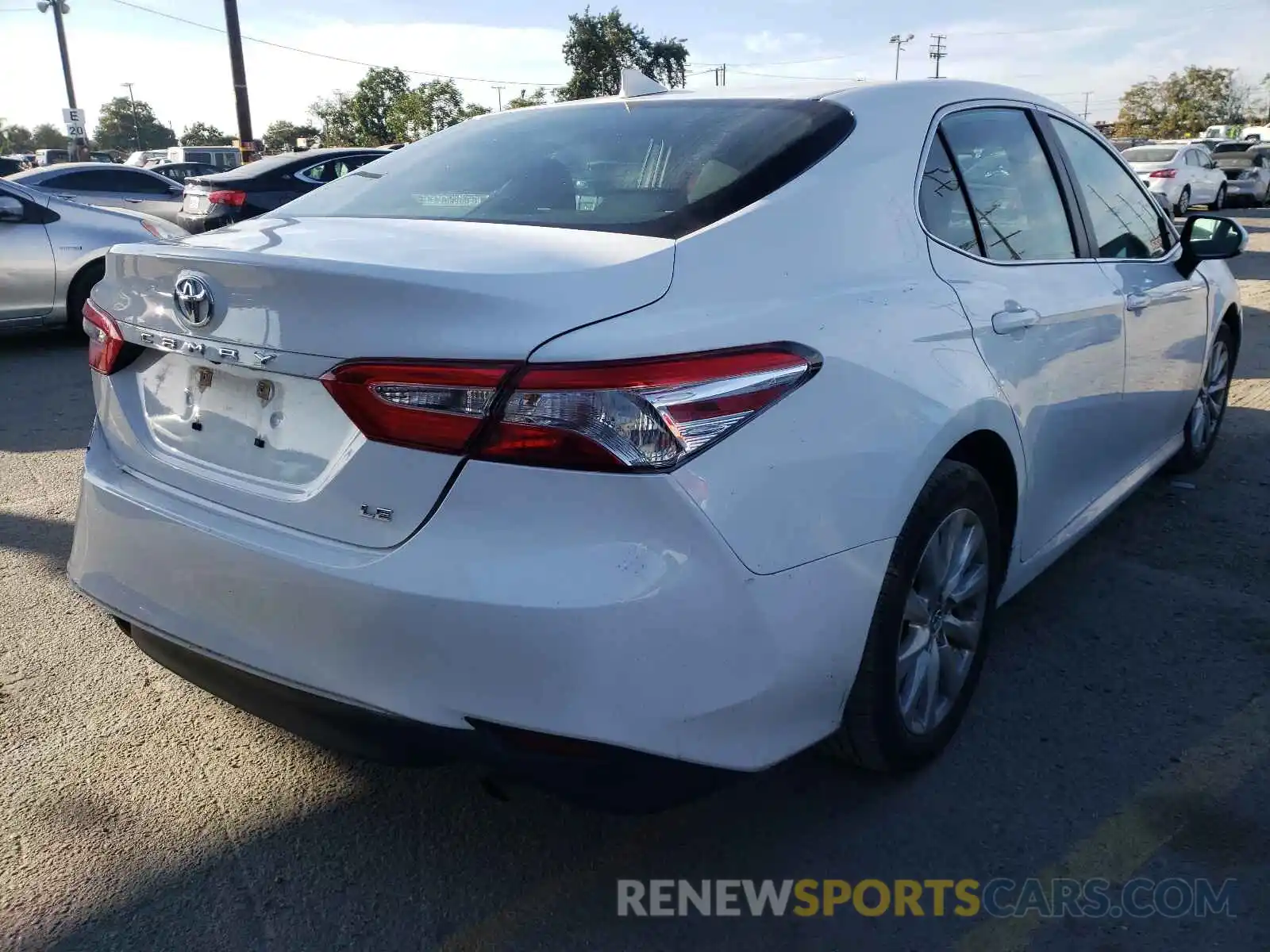 4 Photograph of a damaged car 4T1B11HK2KU254267 TOYOTA CAMRY 2019