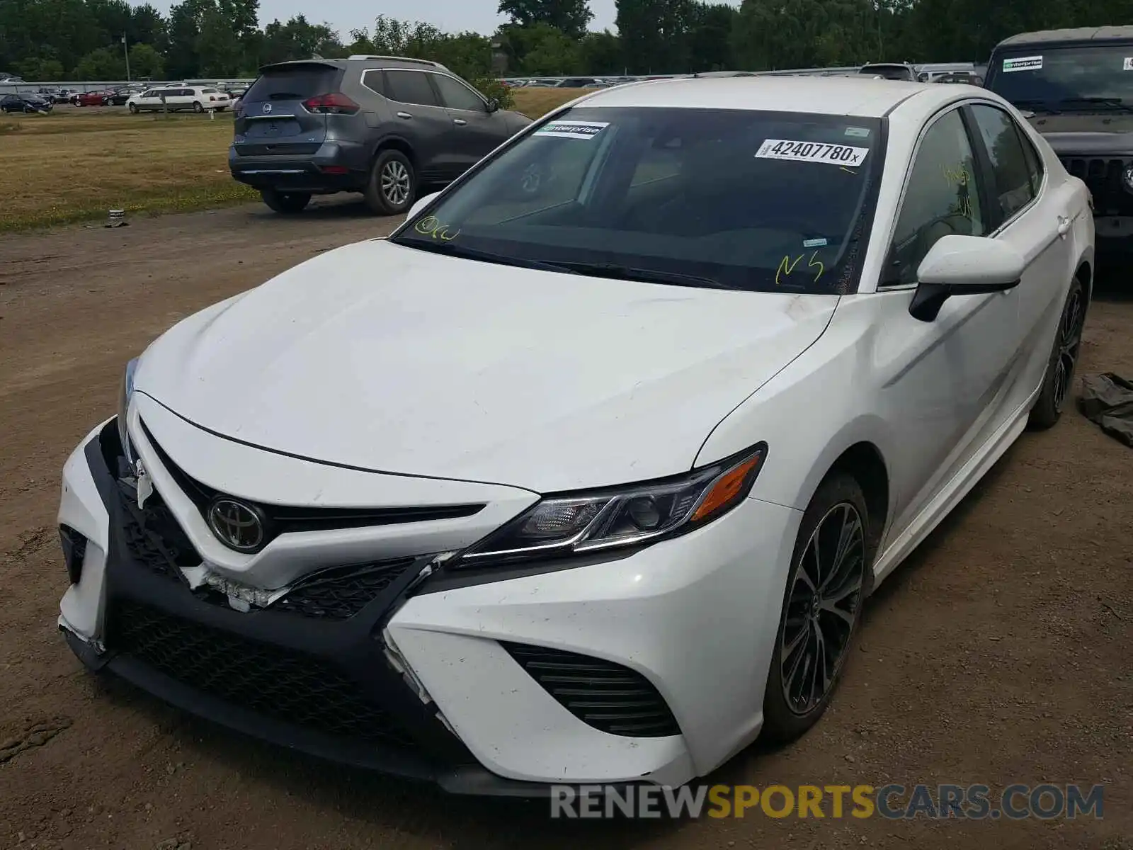 2 Photograph of a damaged car 4T1B11HK2KU255600 TOYOTA CAMRY 2019