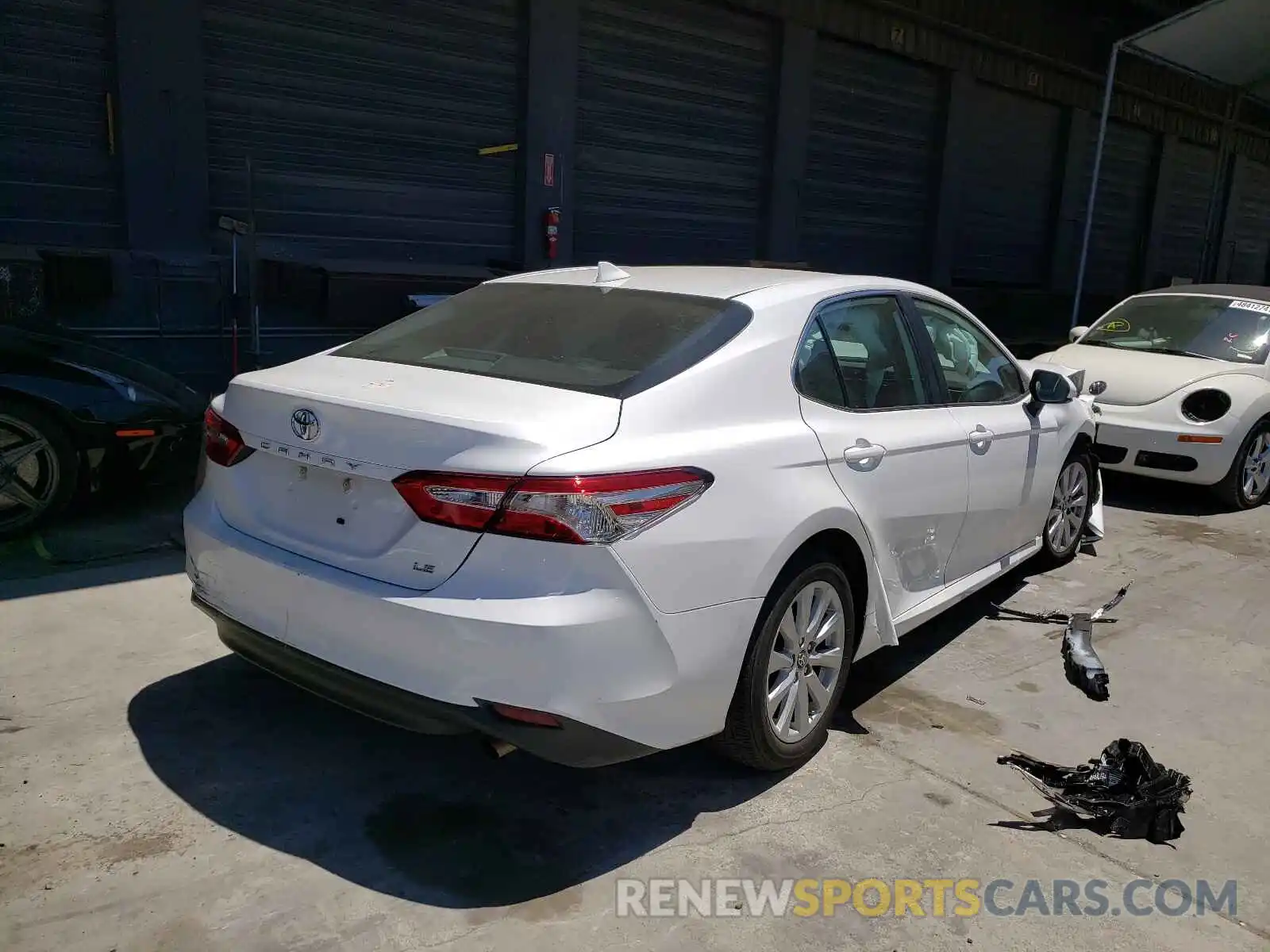 4 Photograph of a damaged car 4T1B11HK2KU255922 TOYOTA CAMRY 2019