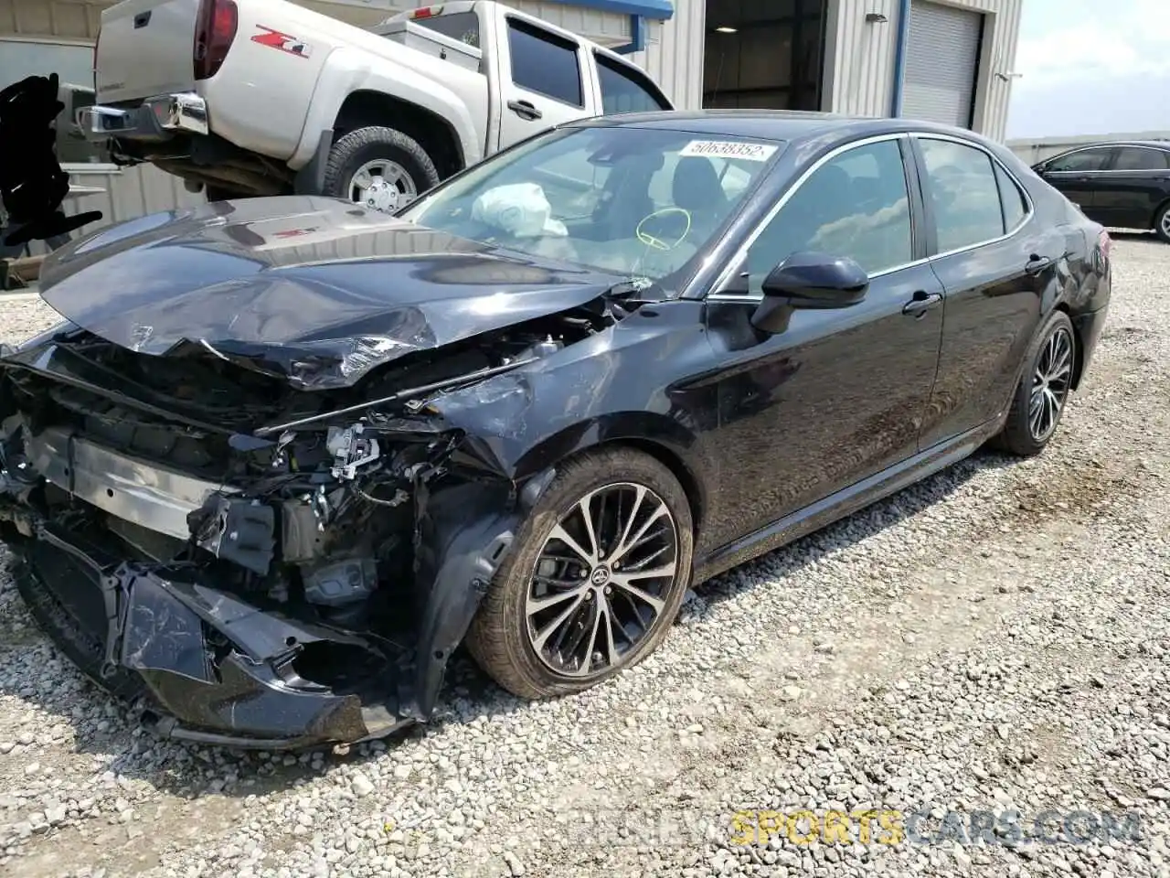 2 Photograph of a damaged car 4T1B11HK2KU256147 TOYOTA CAMRY 2019