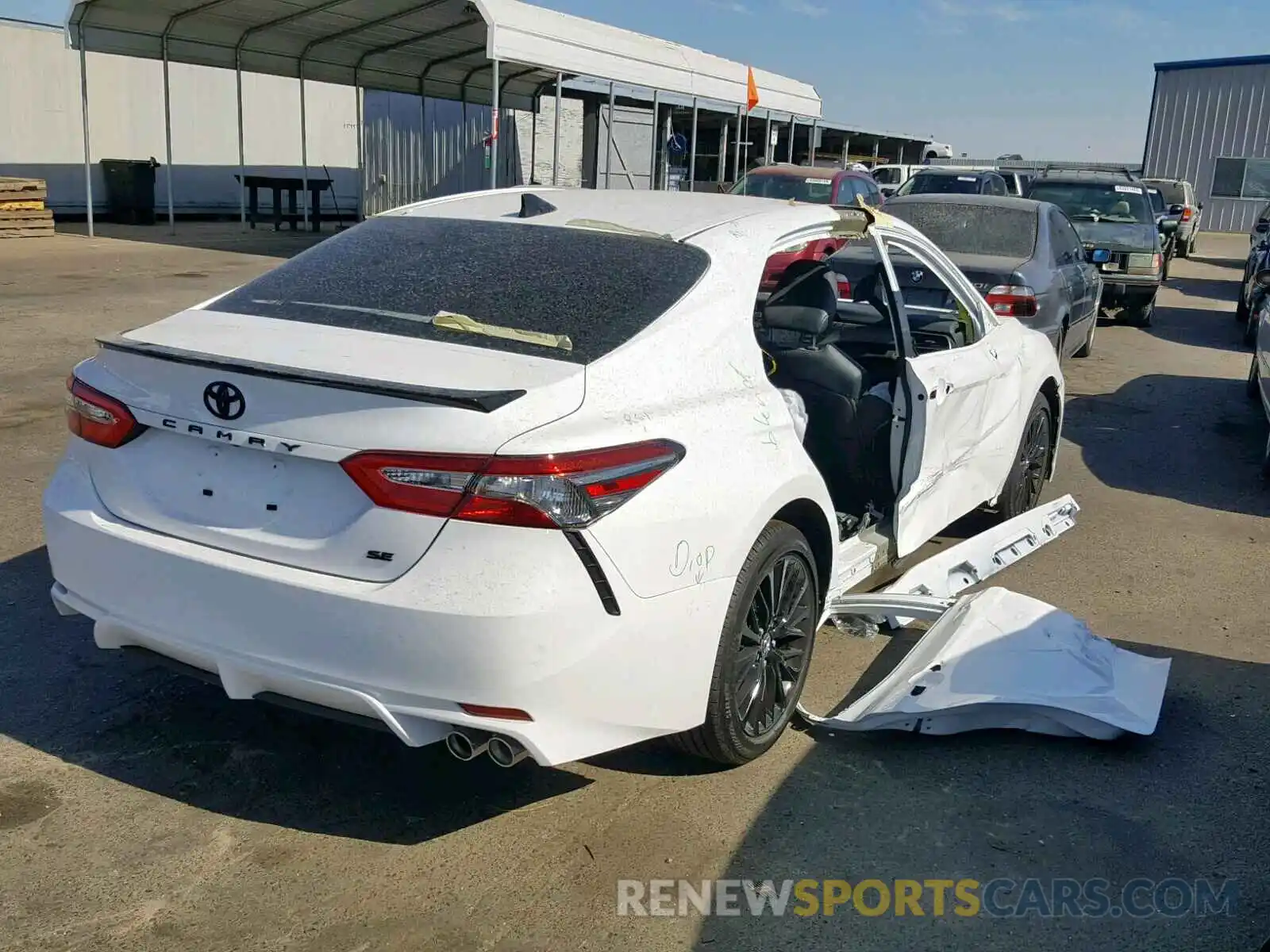 4 Photograph of a damaged car 4T1B11HK2KU256262 TOYOTA CAMRY 2019