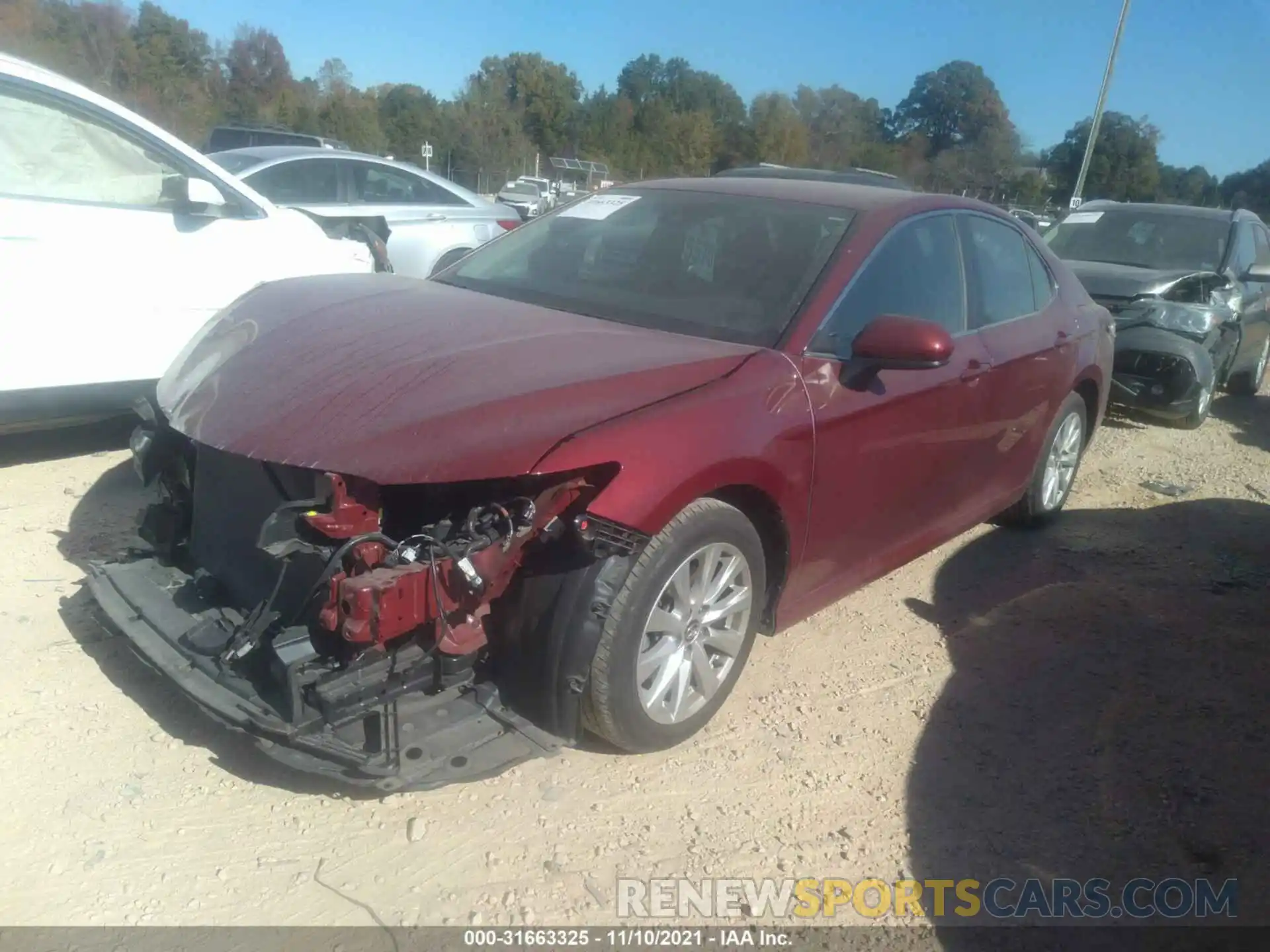 2 Photograph of a damaged car 4T1B11HK2KU257508 TOYOTA CAMRY 2019