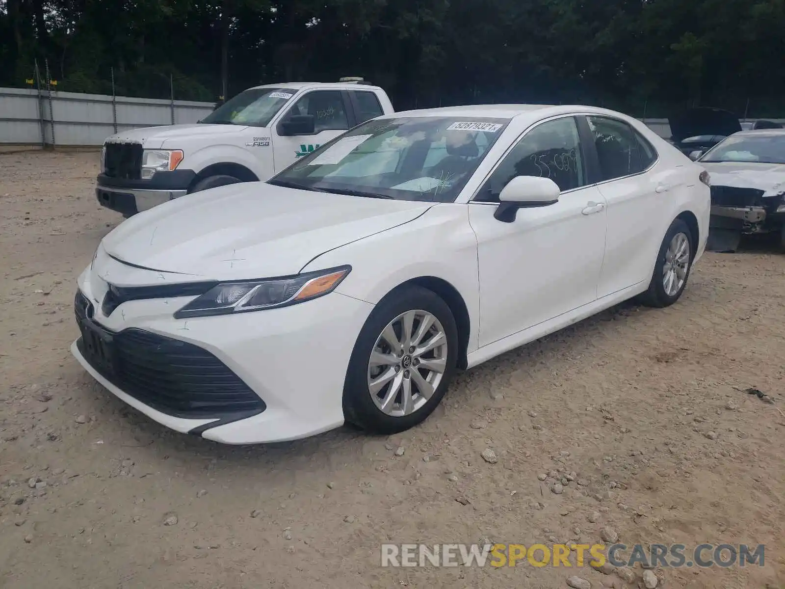 2 Photograph of a damaged car 4T1B11HK2KU258464 TOYOTA CAMRY 2019