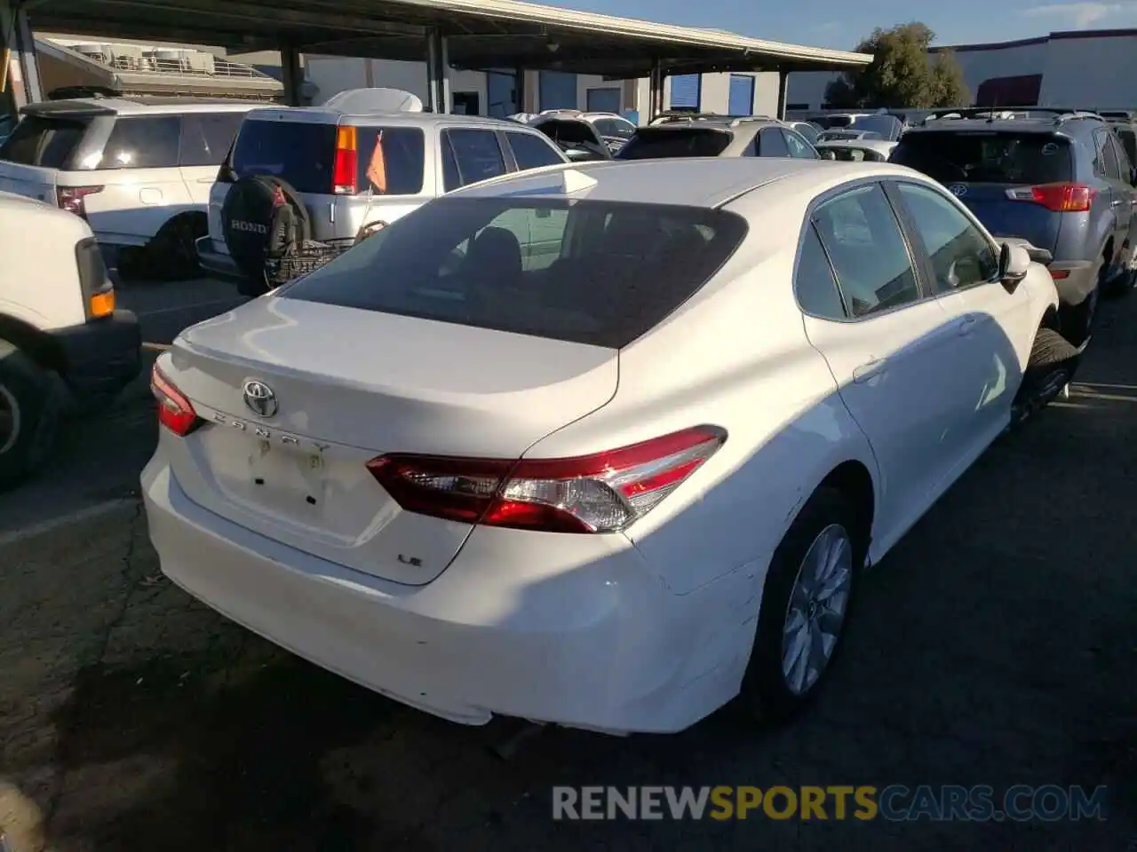 4 Photograph of a damaged car 4T1B11HK2KU258643 TOYOTA CAMRY 2019