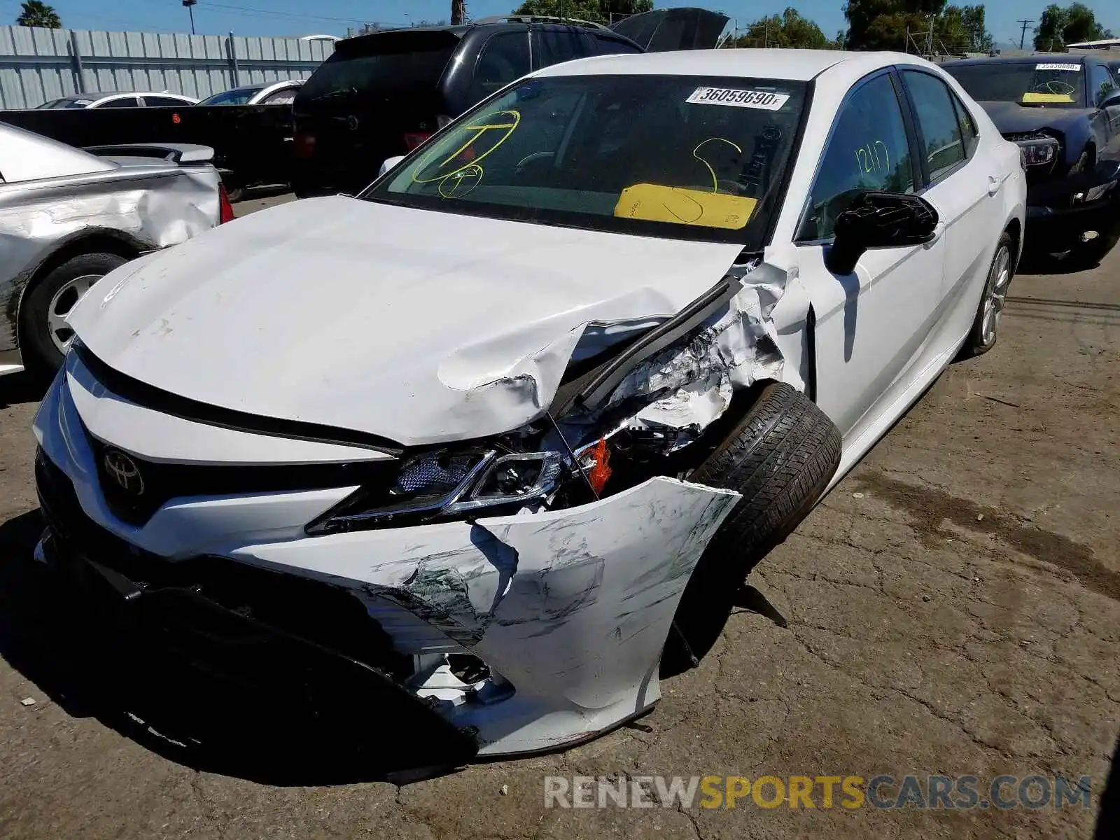 2 Photograph of a damaged car 4T1B11HK2KU259937 TOYOTA CAMRY 2019