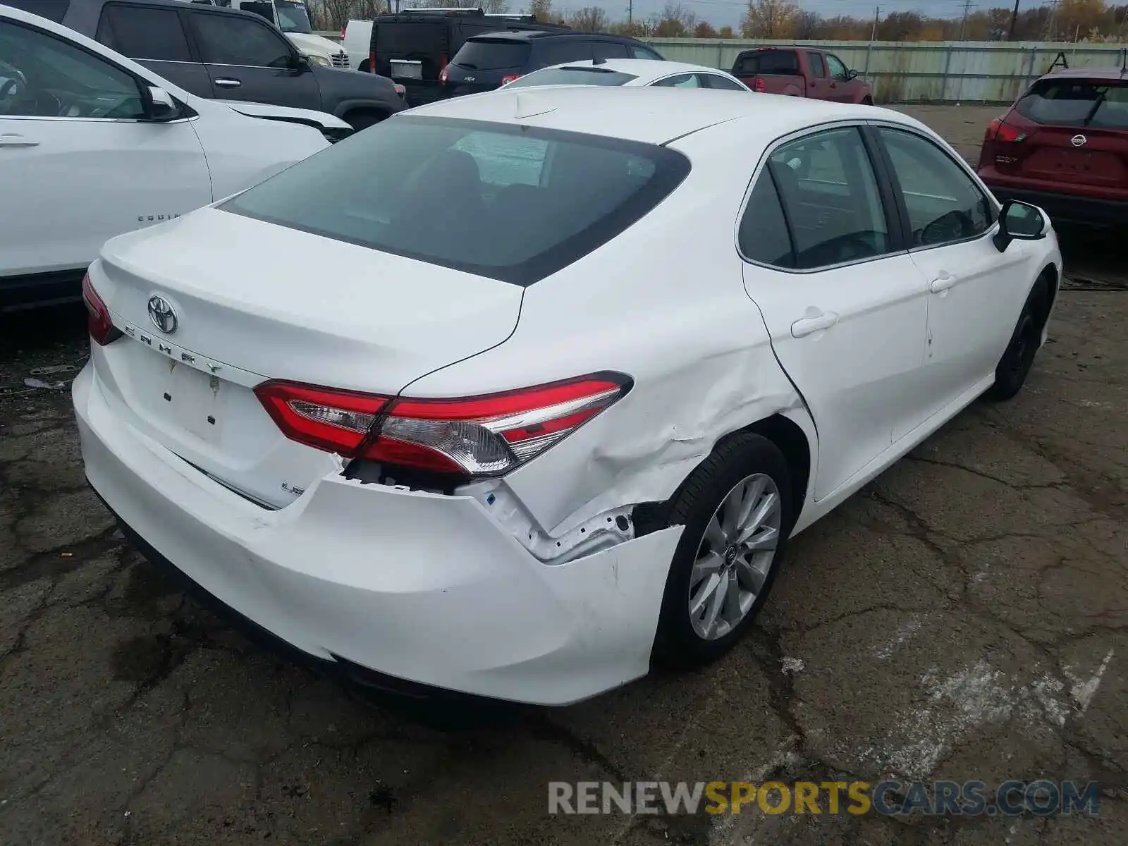 4 Photograph of a damaged car 4T1B11HK2KU261767 TOYOTA CAMRY 2019