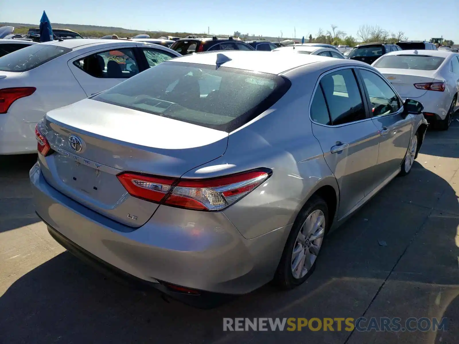 4 Photograph of a damaged car 4T1B11HK2KU265995 TOYOTA CAMRY 2019